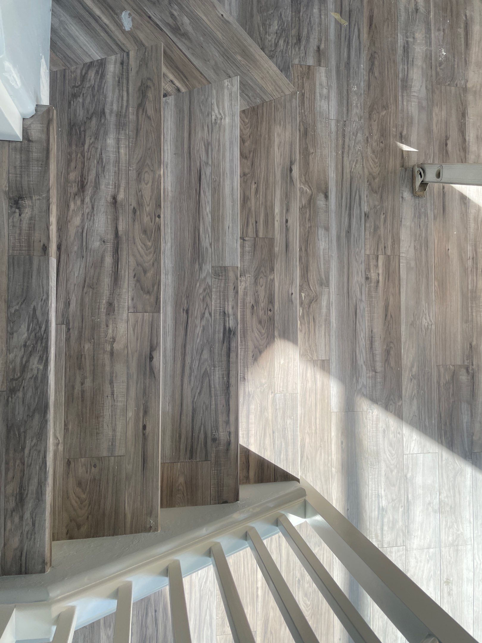 Laminate Staircase and Flooring  by Footprints Floors of Chandler 
