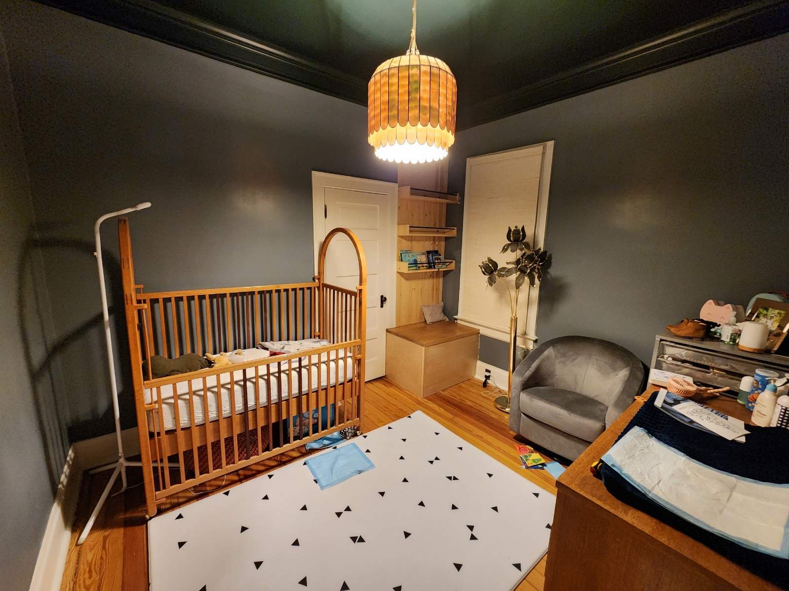 Denver Nursery Renovation Featuring Custom Shiplap and Floral Wallpaper by LP Construction Services