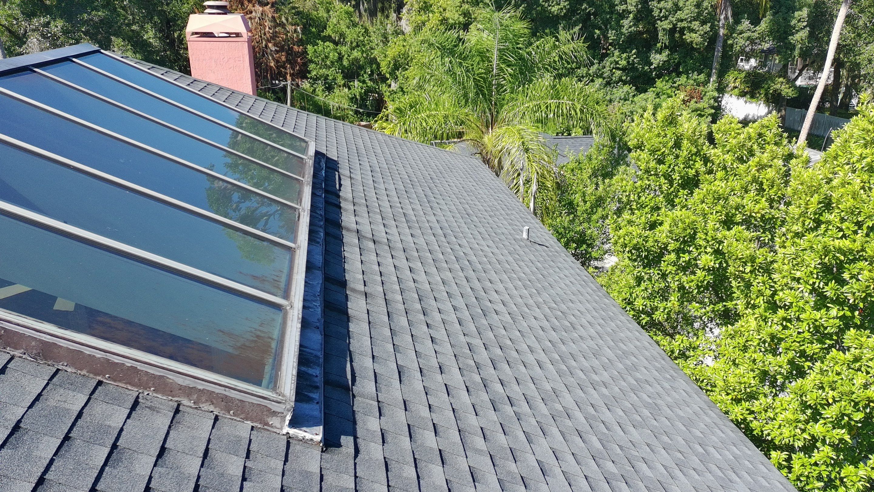 Ridge Skylight Repair and Shingle Roof Maintenance in Winter Park by Fortified Roofing Solutions Corp.