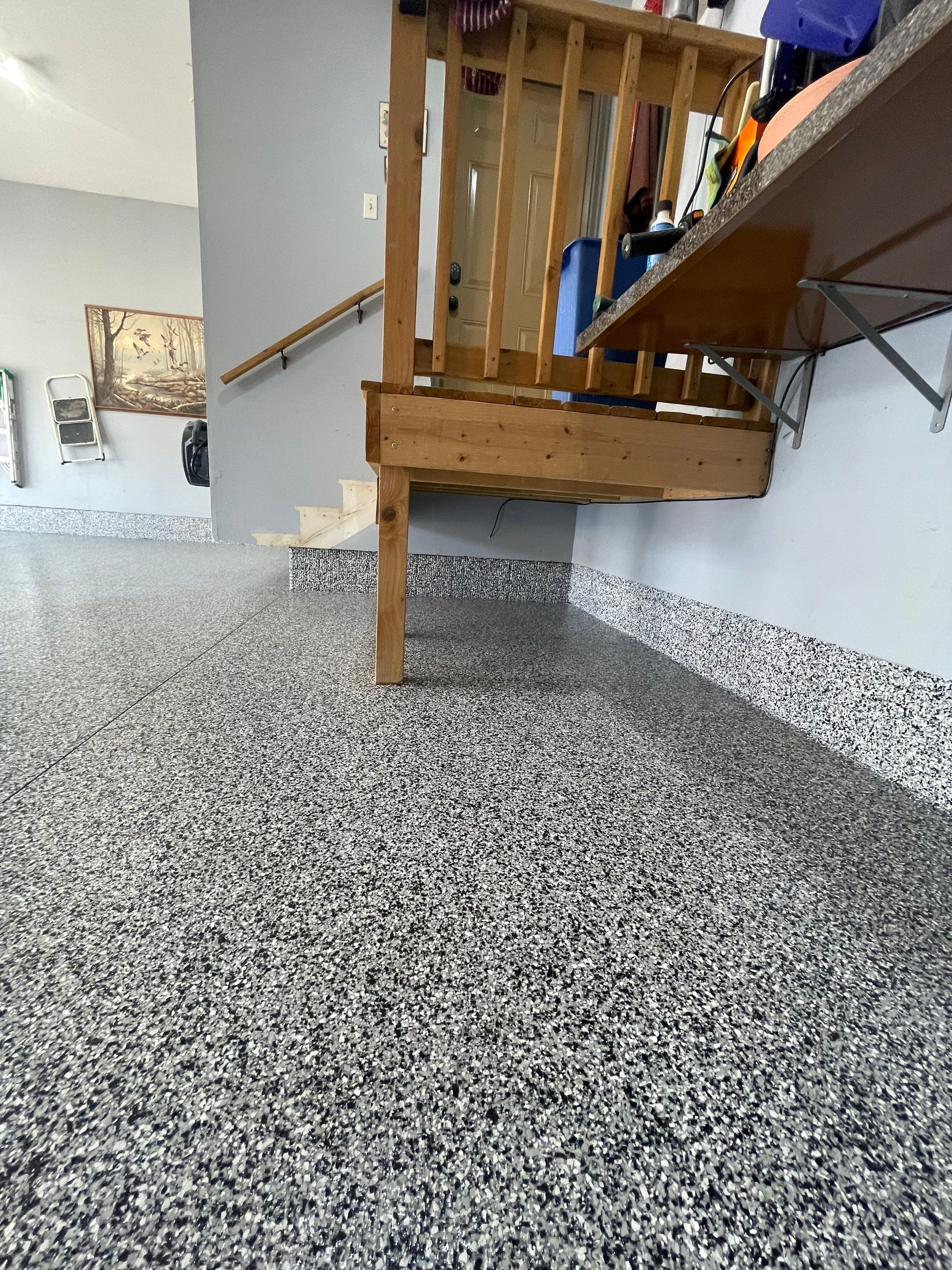 Residential Garage Floor Coating in Sioux Falls by Select Painting, Coatings & Garage Cabinets