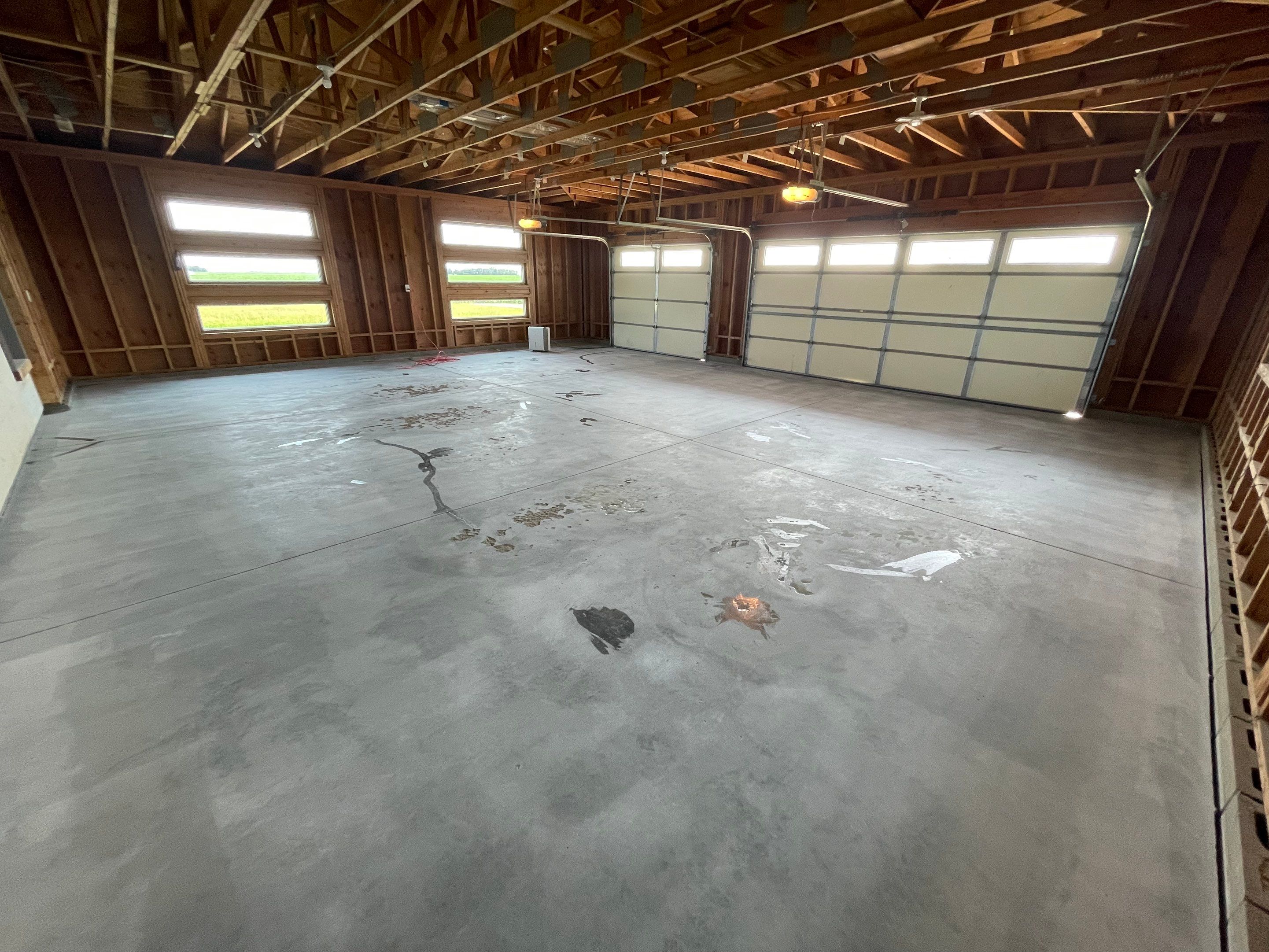 Cabin Fever Coating for Detached Garage in Dell Rapids by Select Painting, Coatings & Garage Cabinets