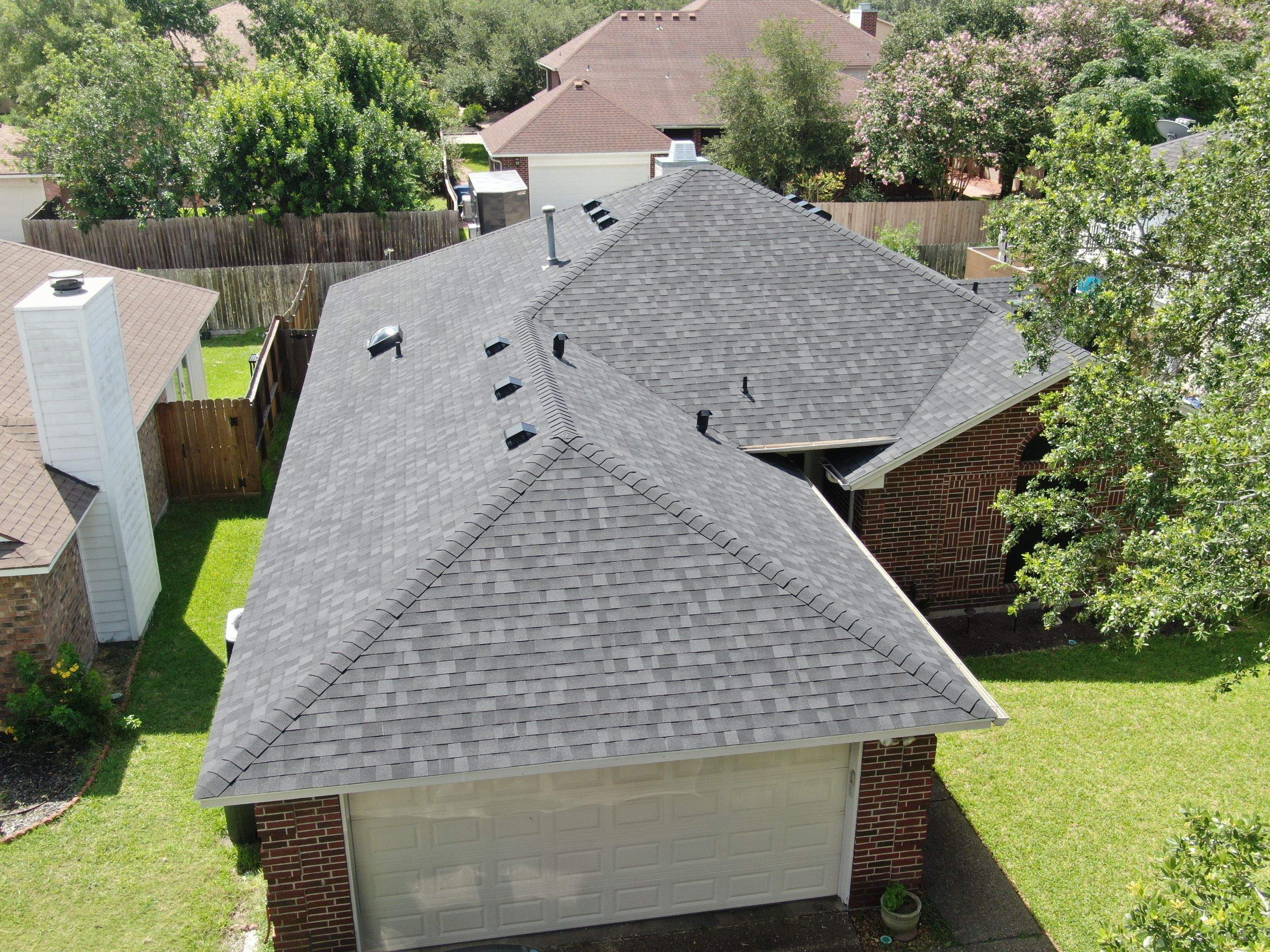 Nothing looks nicer than a little black roof by Bayfront Roofing and Construction