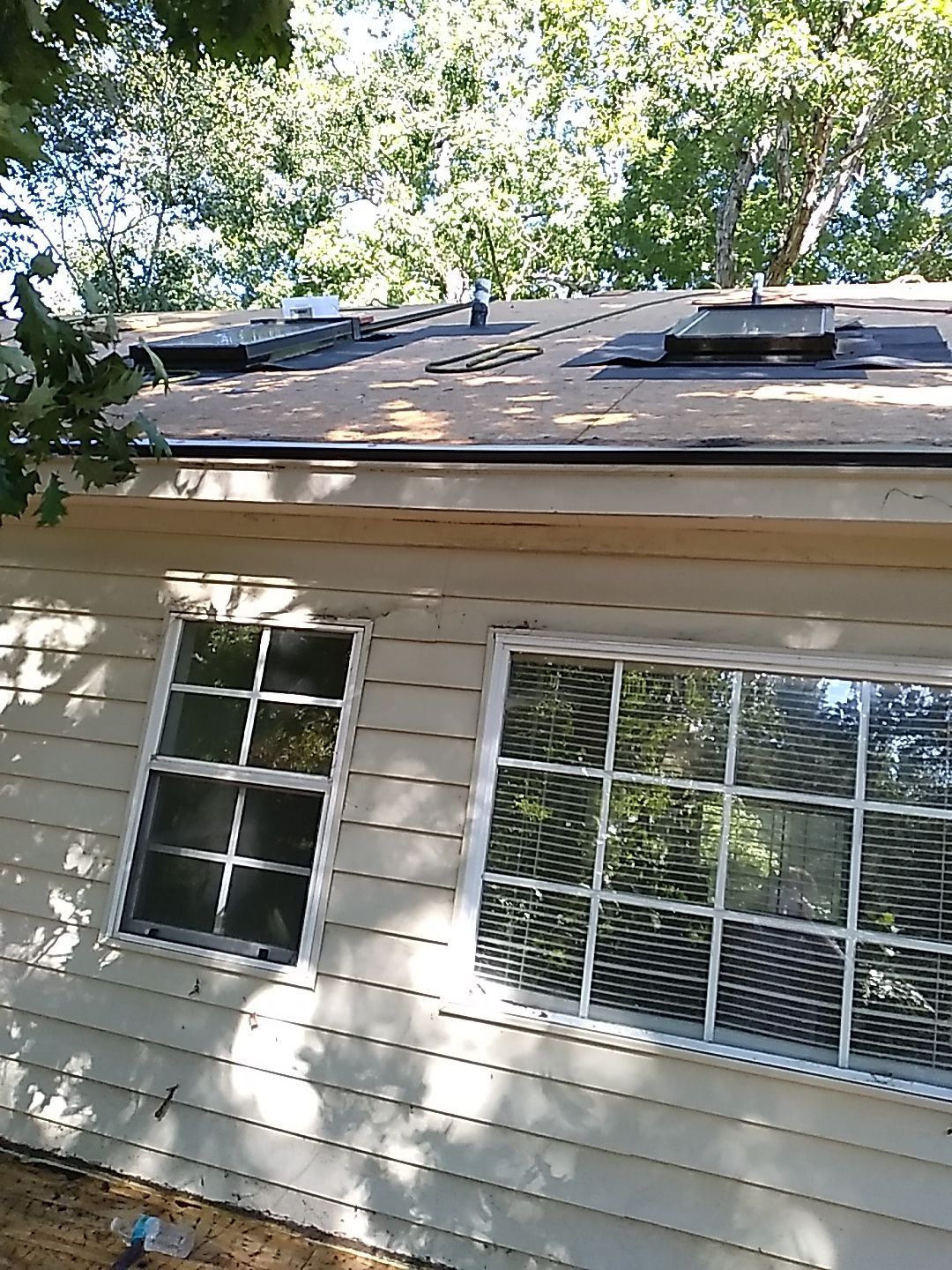 Residential Roofing Installation using Ashphalt Shingles by Indigo State Roofing