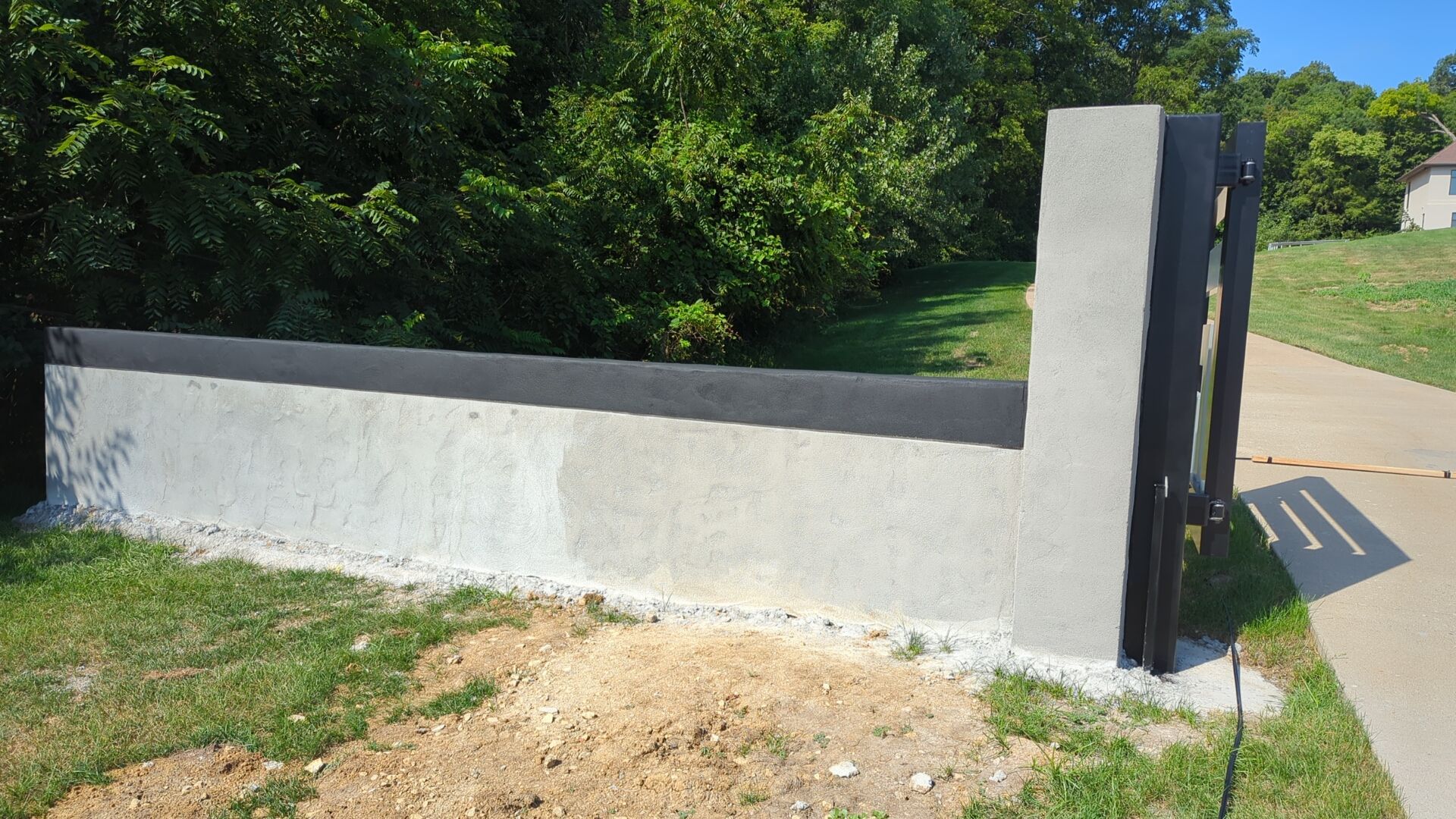 Fence / Retaining Wall using Block then parge by ACE Waterproofing & Basement Solutions