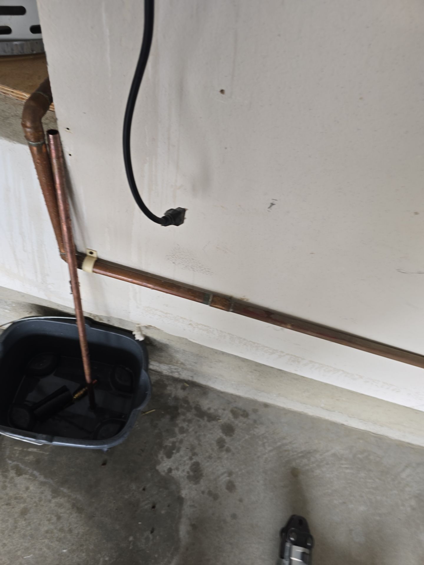 Fixing Water Leak by Us Plumbing