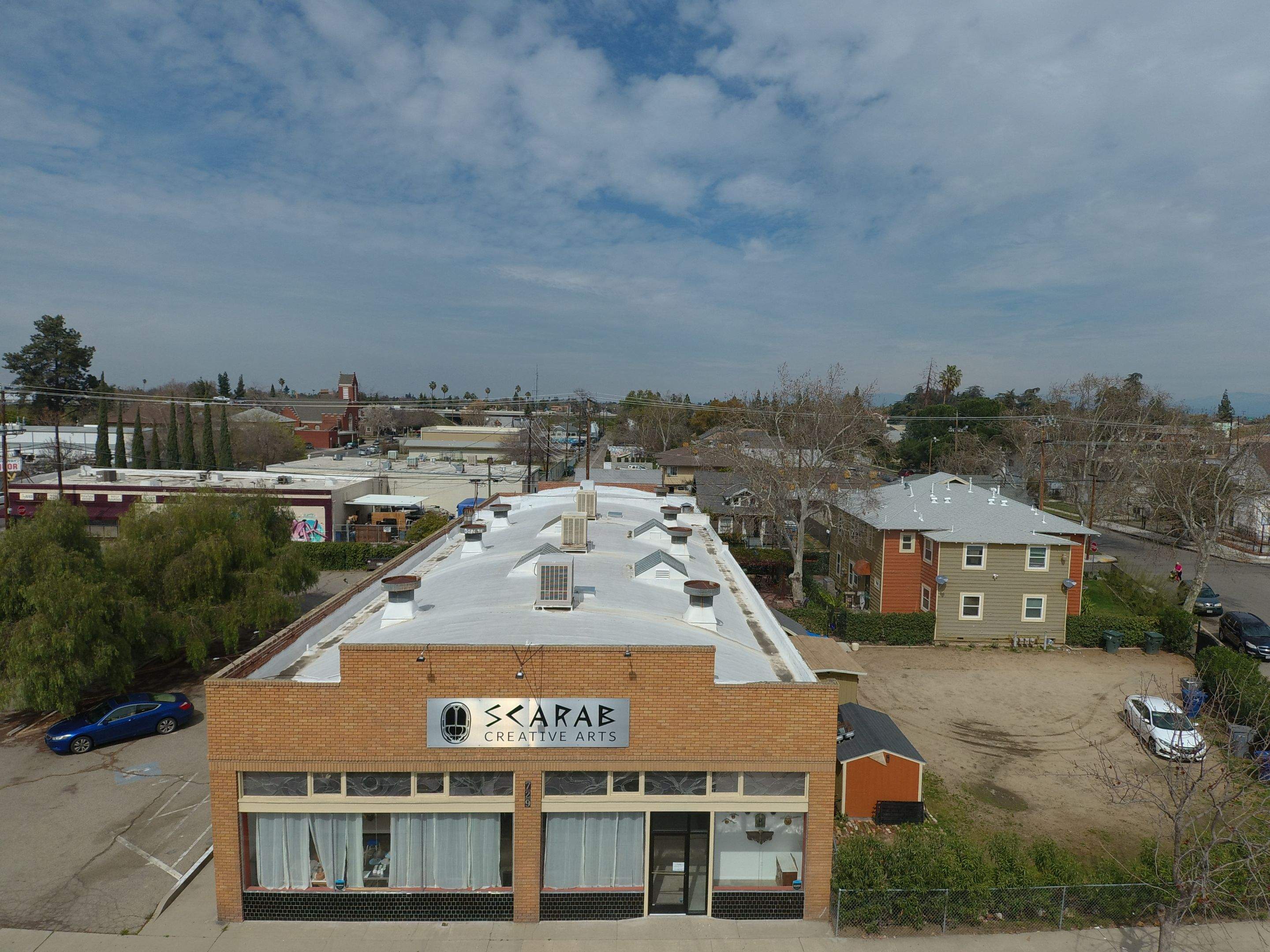 Polyurethane foam roof refurbish and recoating by Straight Edge Roofing Inc