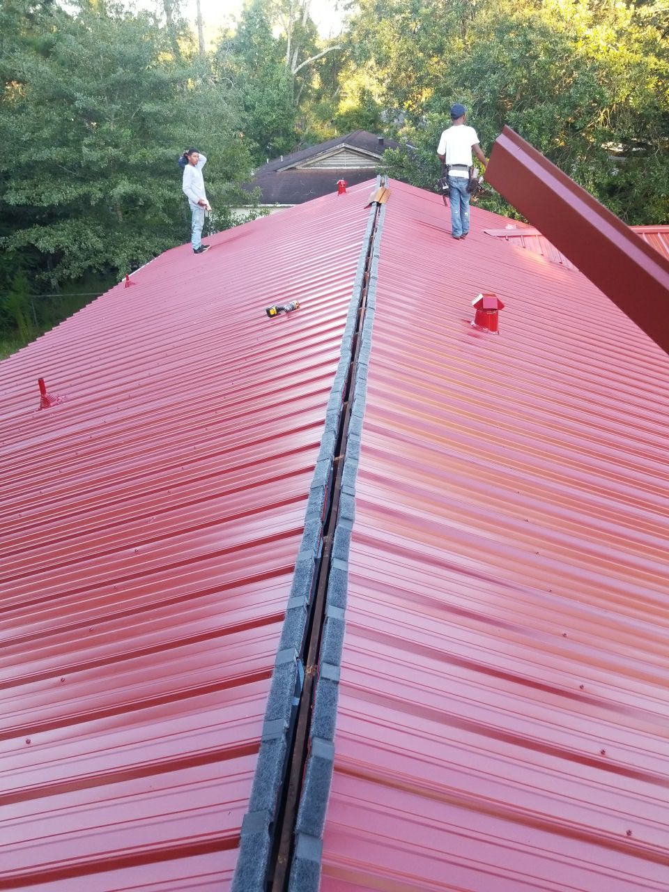 Residential Roofing Installation using Metal roofing by American Roofing & Construction LLC