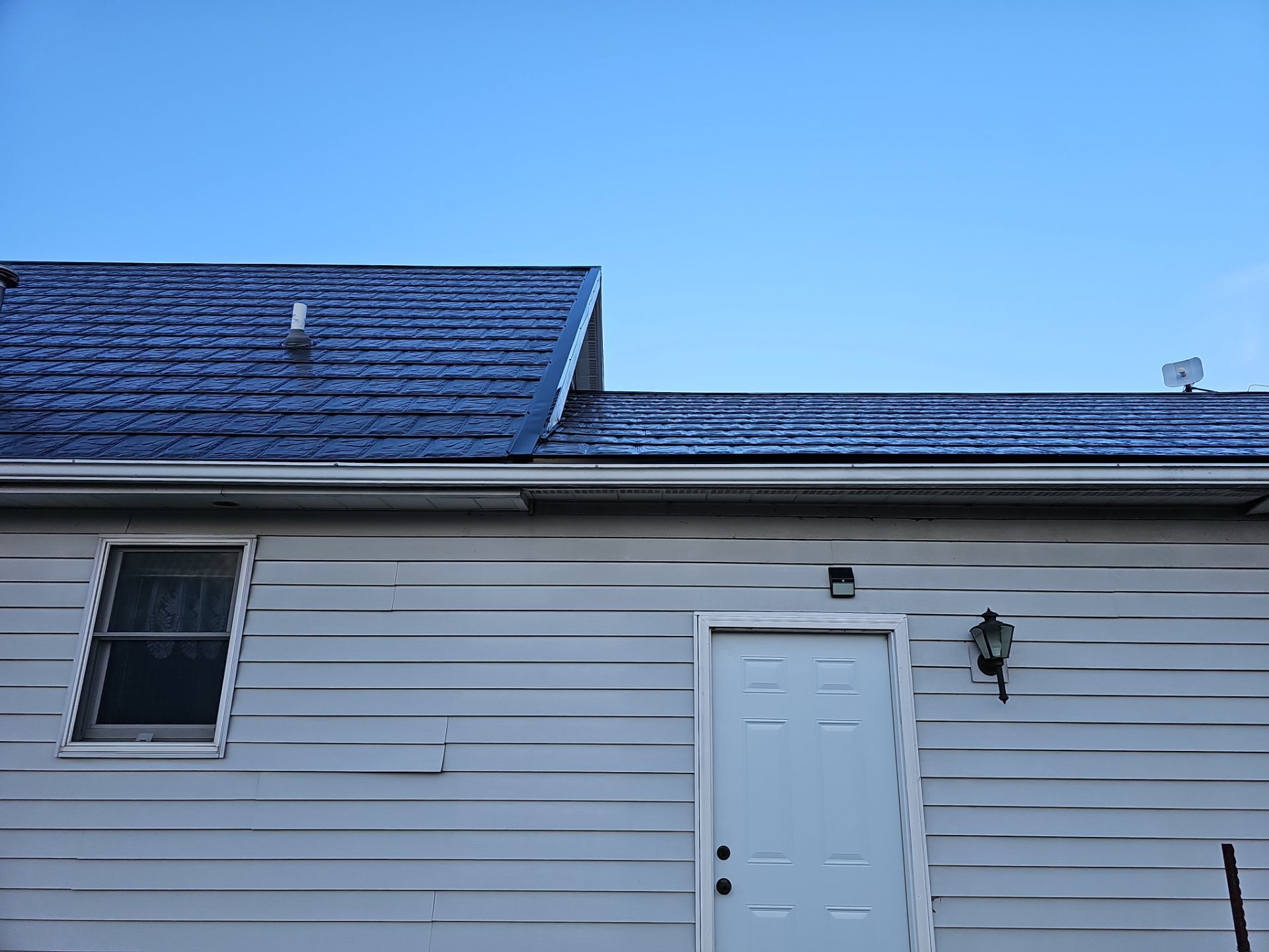 Residential Roofing Installation using Metstar Slate Plus Smooth Black by Nitro Roofing and Construction