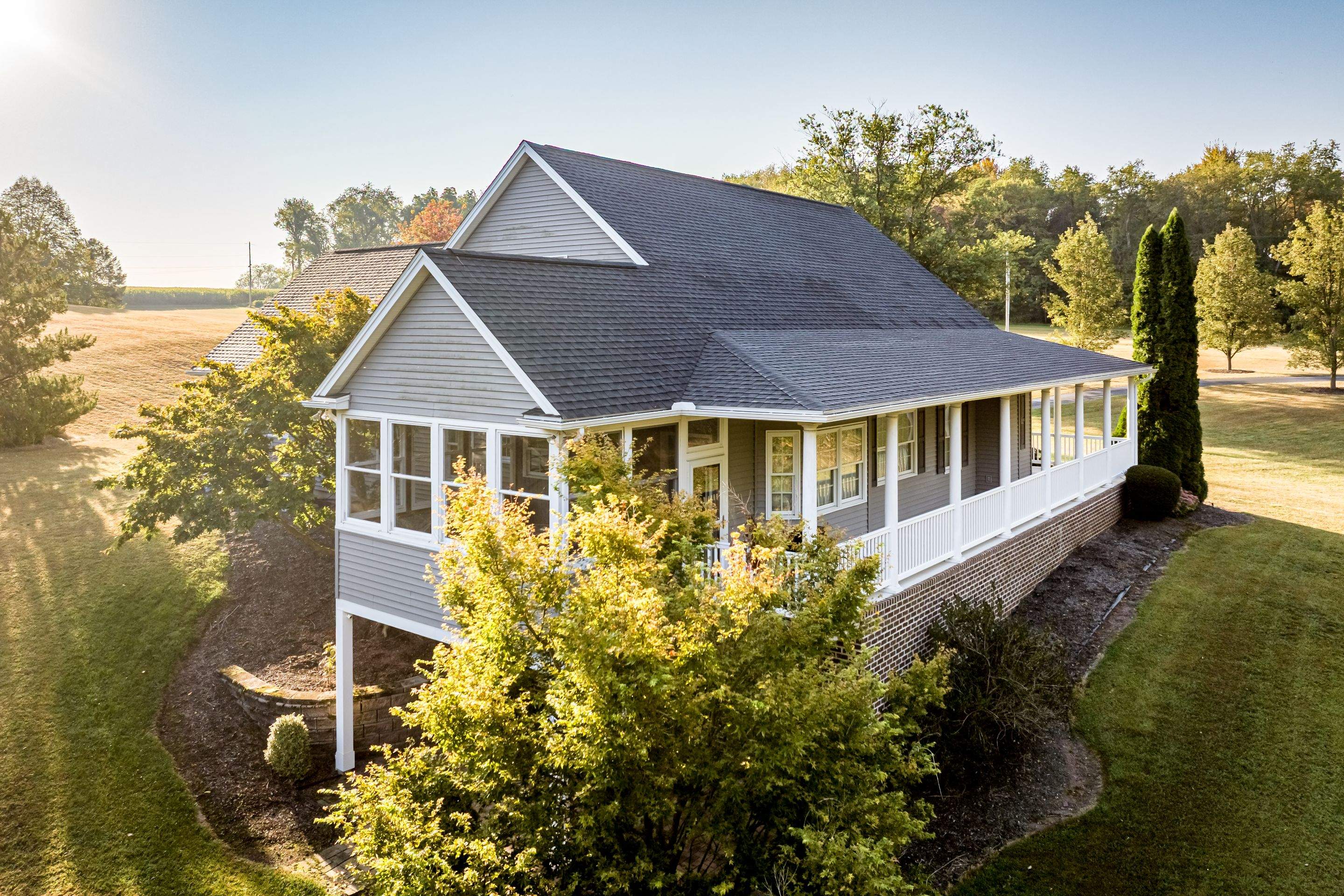Full Vinyl Siding Replacement and Shingle Roof Install in Millersburg by Esh Builders
