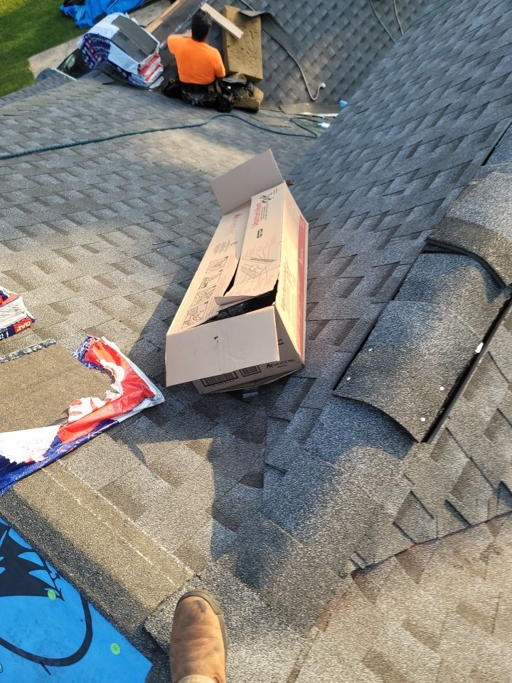 Residential Roofing Installation using Roof Replacement by American Roofing & Construction LLC