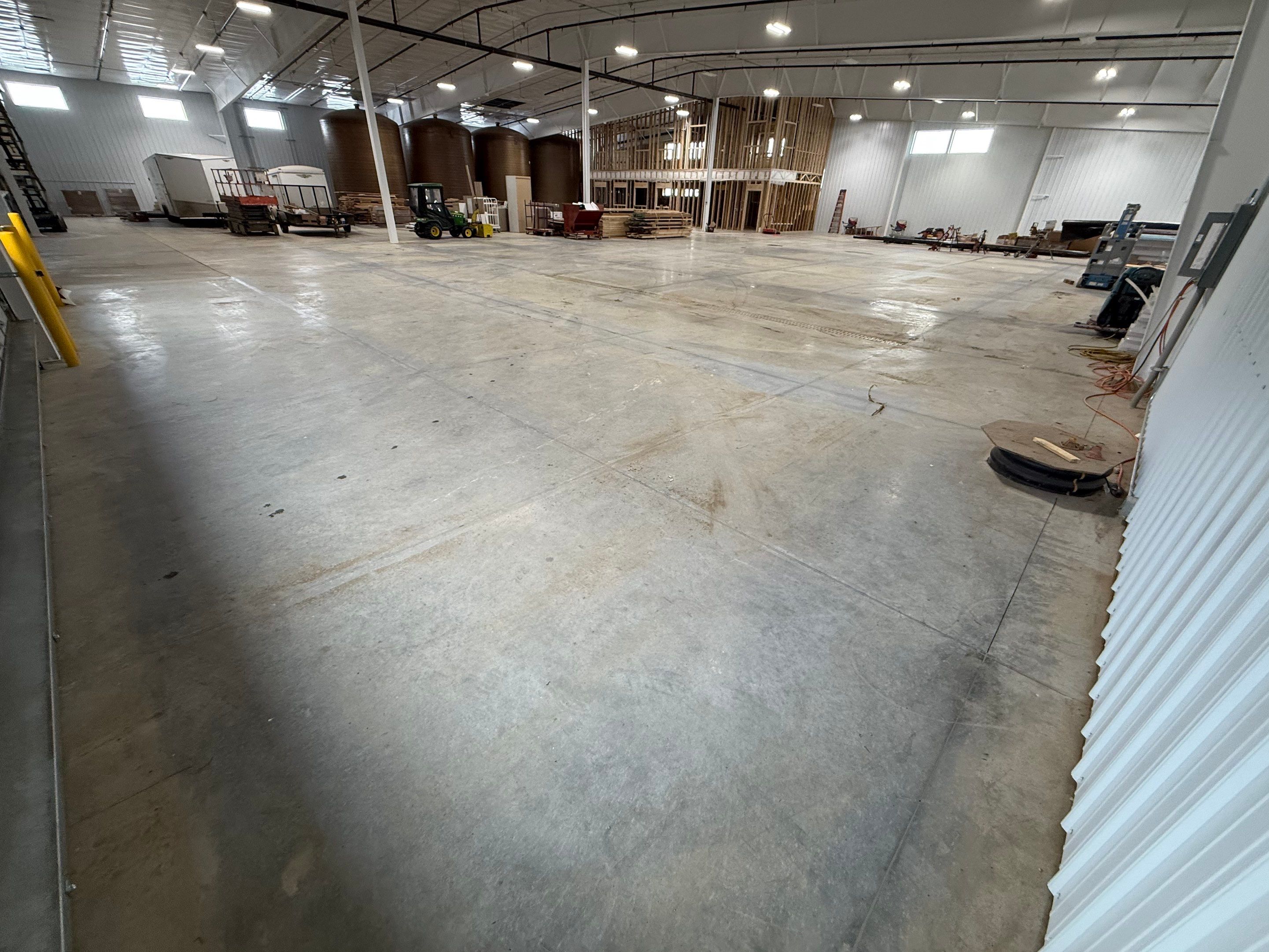Industrial Concrete Polishing and Coating for Large Manufacturing Warehouse by Select Painting, Coatings & Garage Cabinets