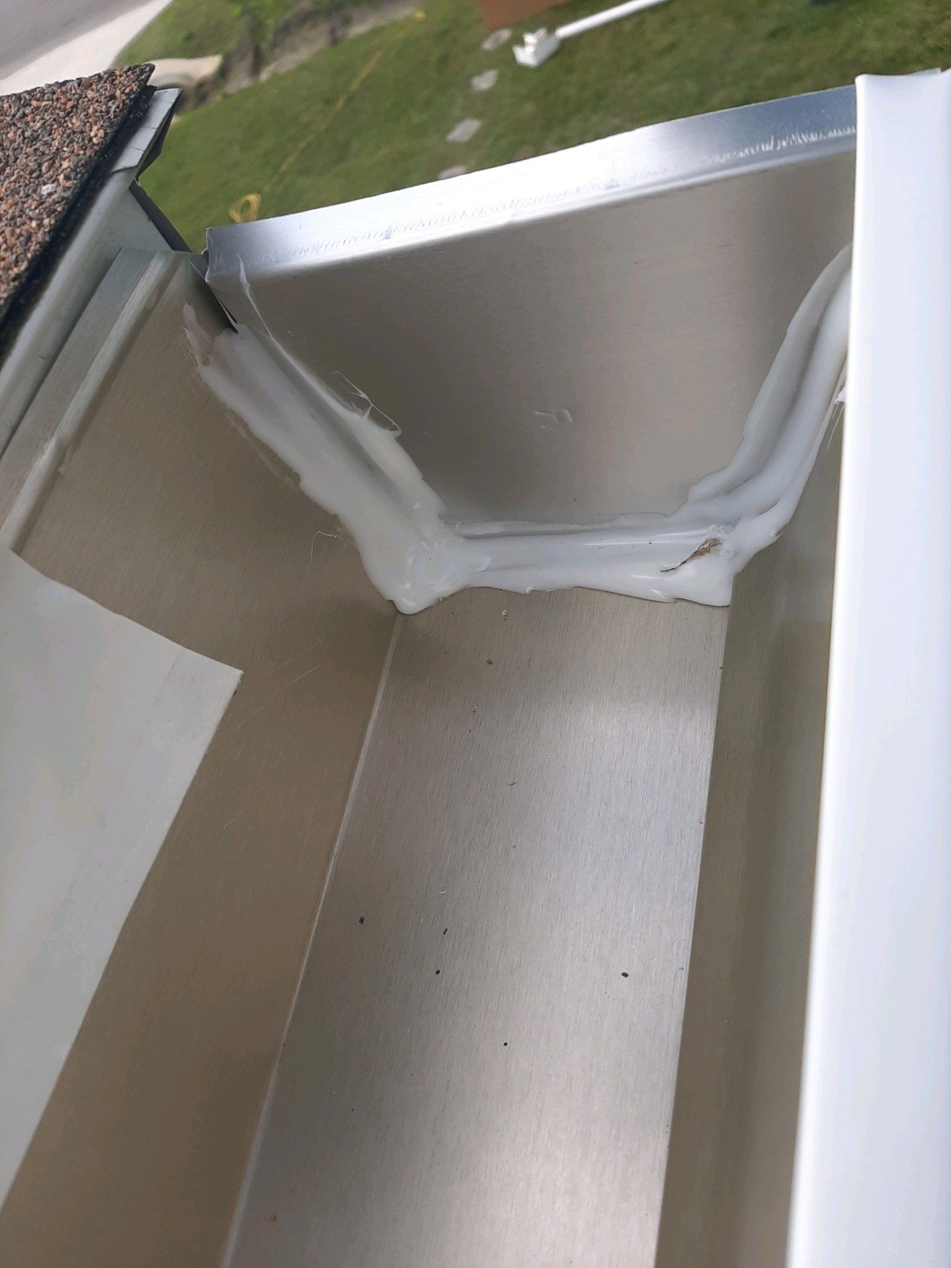 Gutter Installation using White Seamless Gutters by Gutter Professors