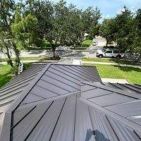 24ga 1.5" Mechanical Seam Dark Bronze by Total Roofing System The Metal Roof Experts