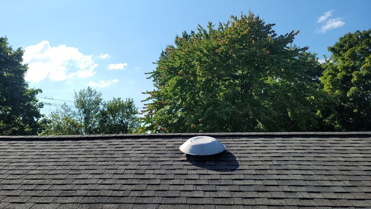 ATLAS PINNACLE COLOR: PRISTINE BLACK SHADOW DRIP EDGE: WHITE by Eagle Eye Roofing