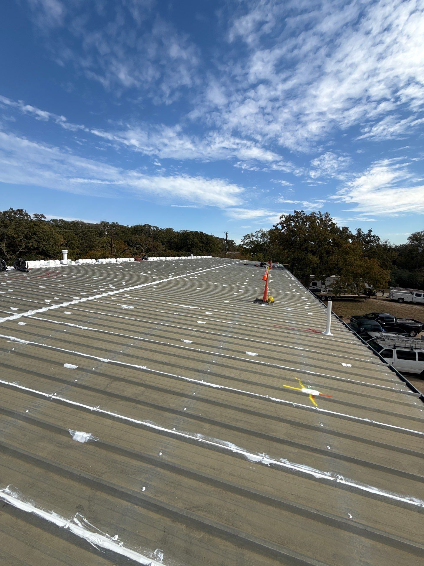 Silicone Coating Metal Rehab by First Out Roofing 