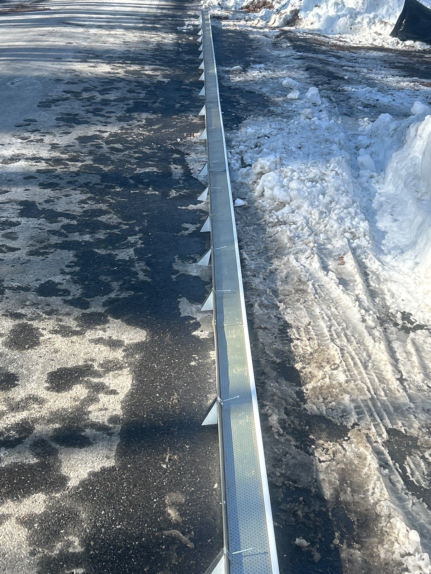 Gutter Installation Project in Stow by Mighty Dog Roofing of Greater Middlesex County