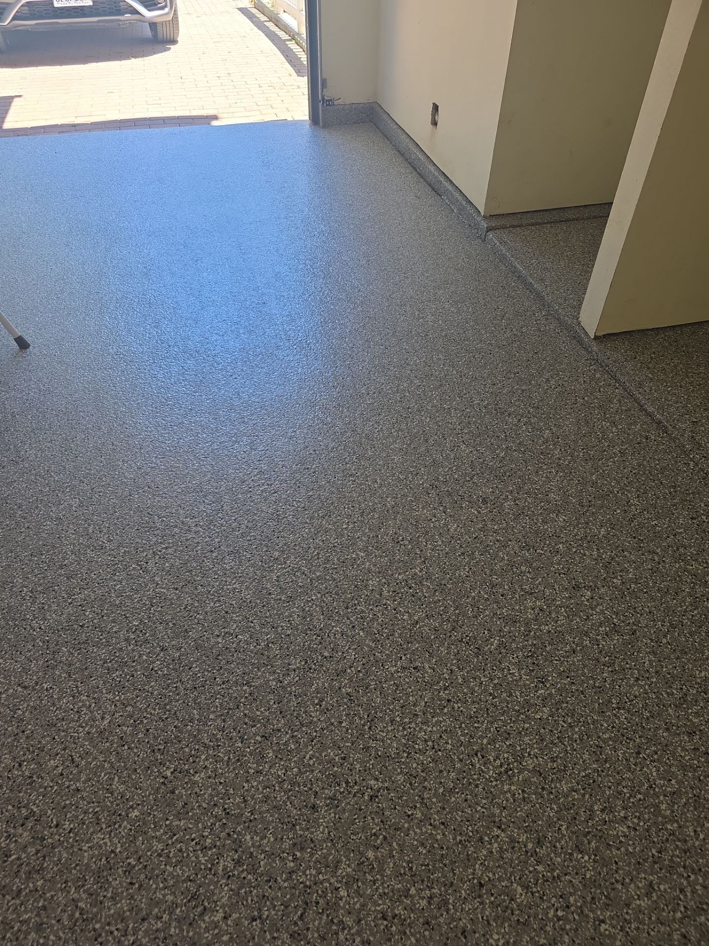 Polyurea Garage Floor Transformation with Stonewash Chips in Cambria by MGP Coatings