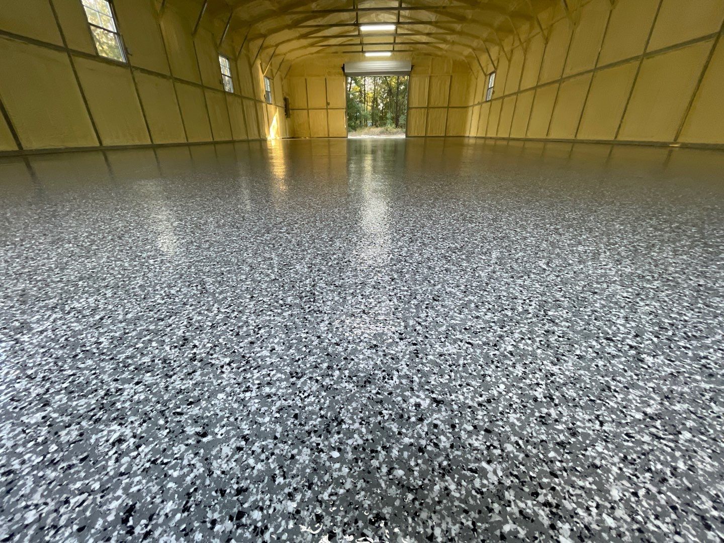 Metal Building/Kennel in Williston, FL in Smoke by Cross Creek Concrete Coatings