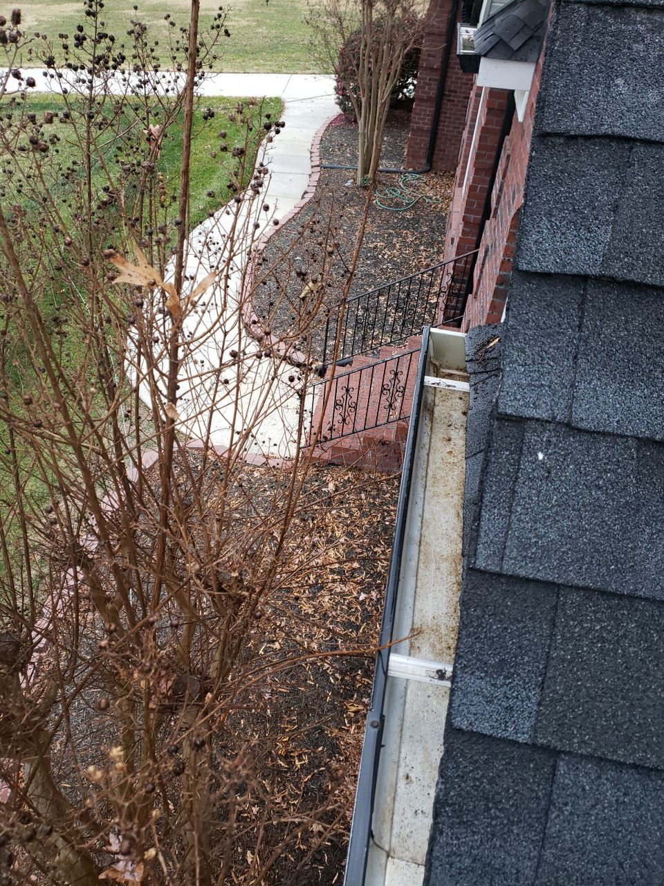 Gutter Cleaning using water by Power Wash Masters LLC