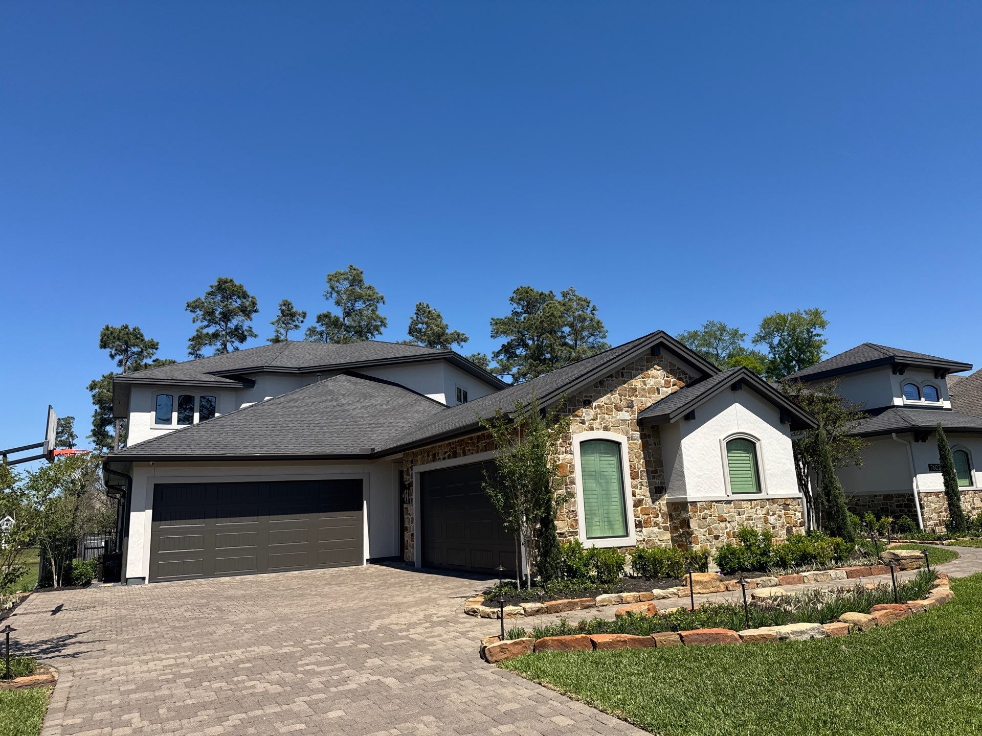 Complete Exterior Painting and Stucco Refinishing in Spring by Rolling Nations