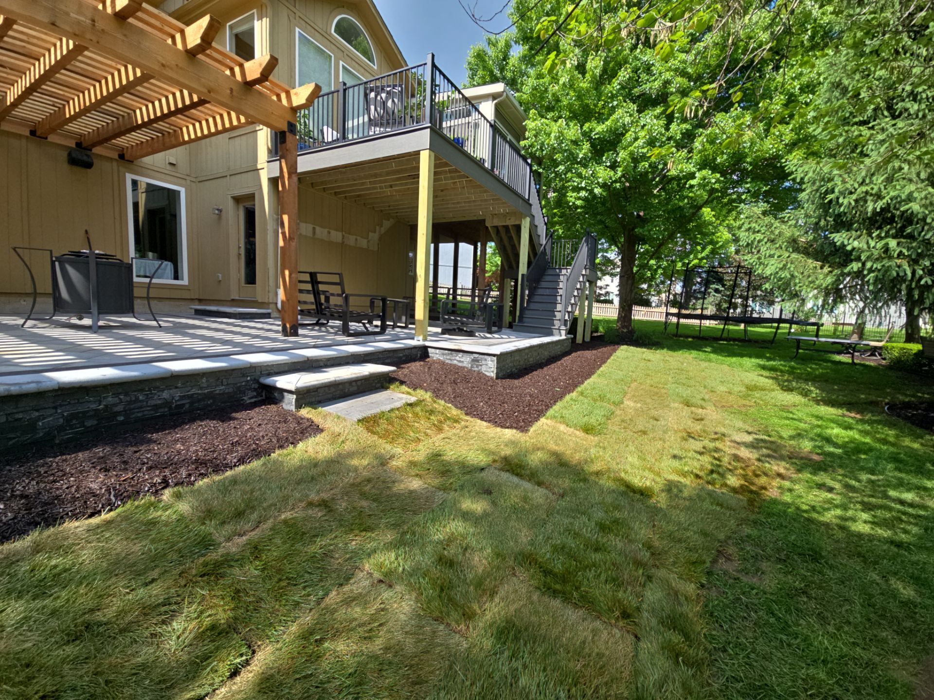 Back Yard Patio, Pergola, and Deck by LAND ESCAPES LLC