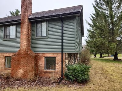 Siding Replacement using CertainTeed Restoration Classis D4