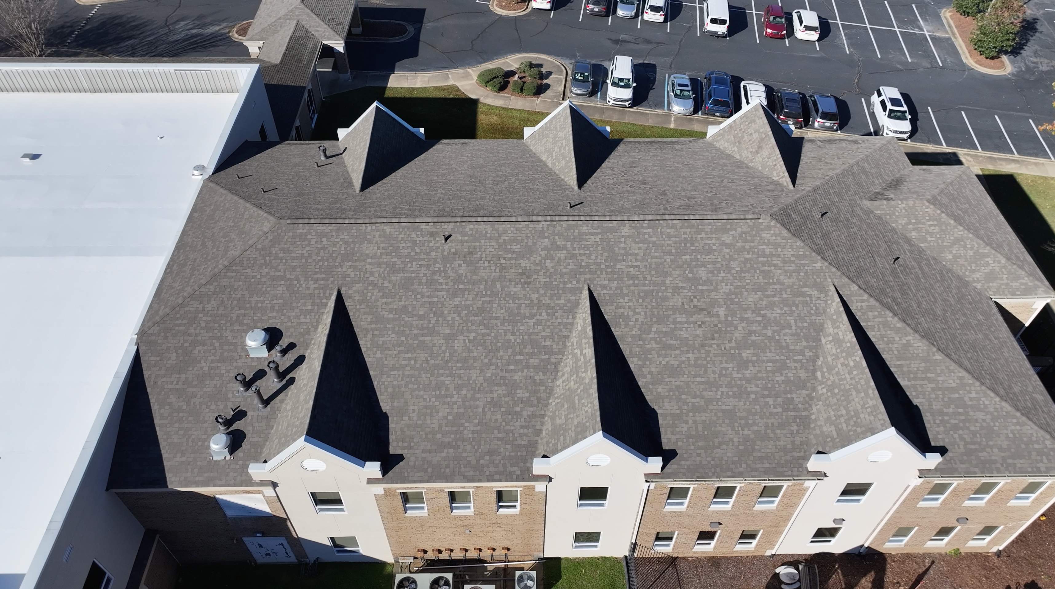 Commercial Shingle and TPO Roof Replacement | Clinton, MS by Watkins Construction & Roofing