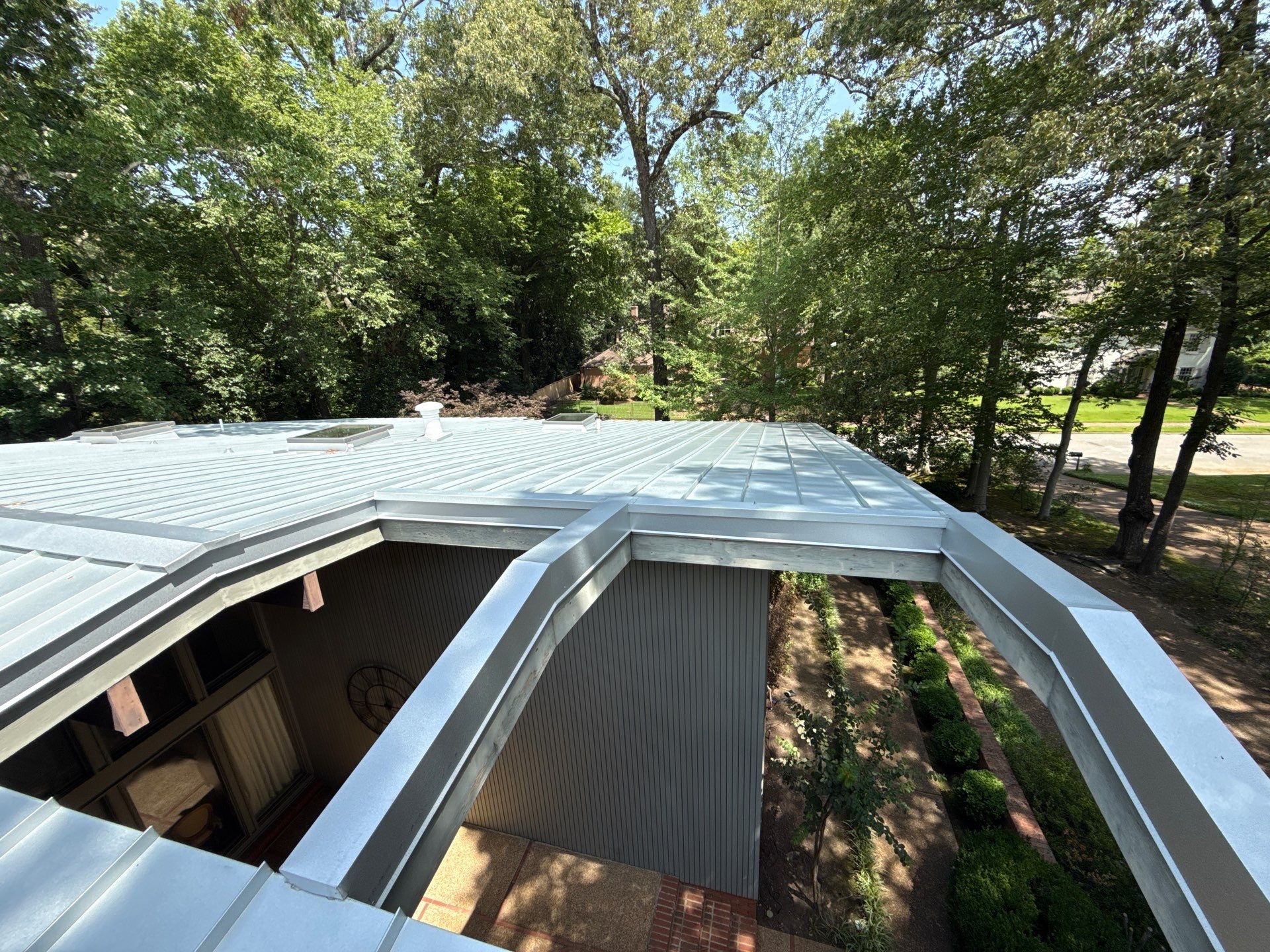 Residential Standing Seam Metal Roof and Membrane Replacement in Memphis by Revival Roofing Services