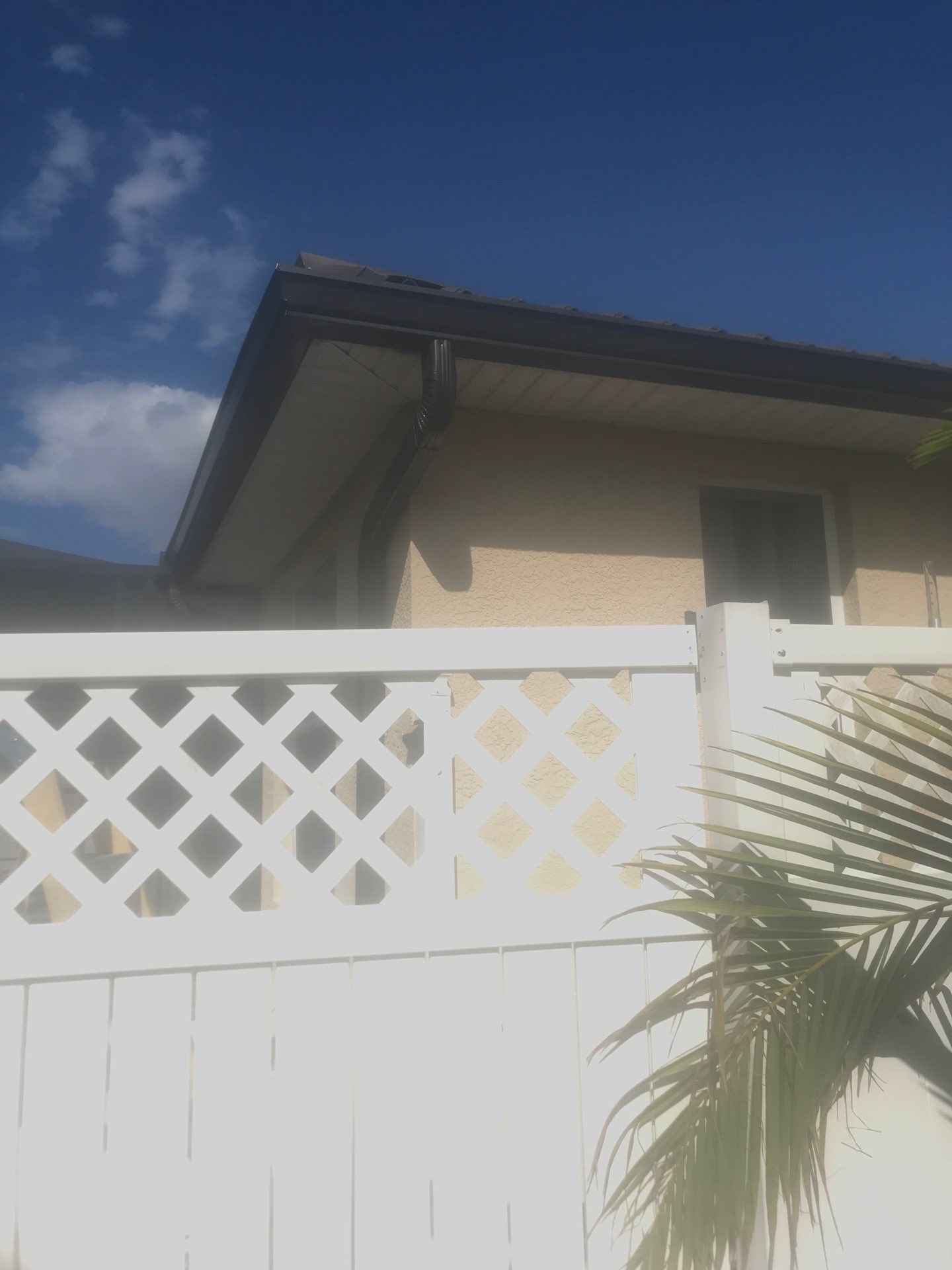 Brown Seamless Gutters Installation in Cape Coral FL by Gutter Professors
