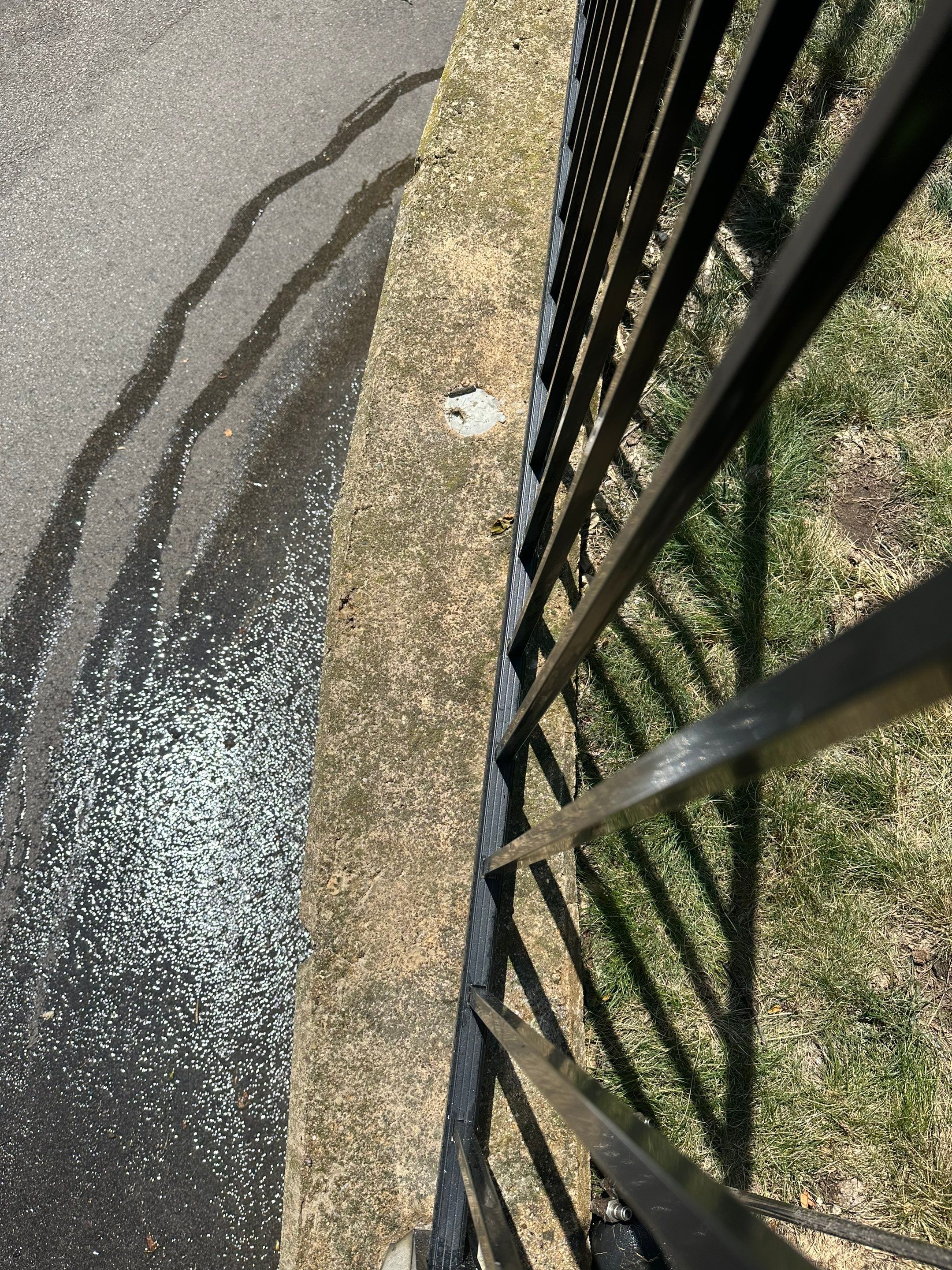 Parking garage using Hot water by Northern Power Washing LLC.