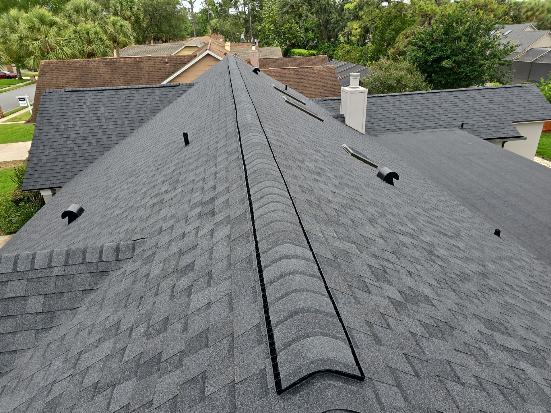 Asphalt Architectural Shingle Roof Replacement and Solar Integration in Longwood by Fortified Roofing Solutions Corp.