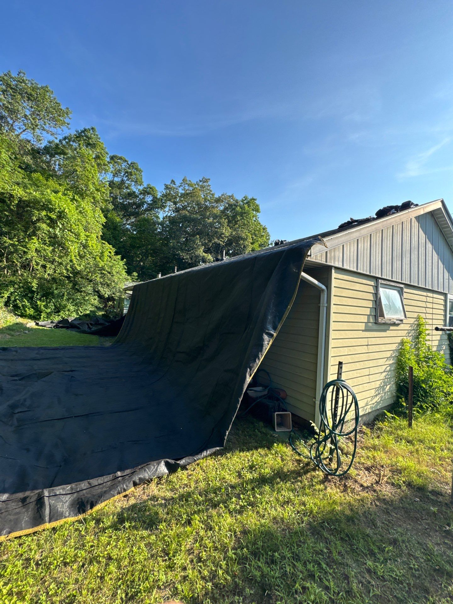 Onyx Black Roof Transformation in Maynard, MA by Mighty Dog Roofing of Greater Middlesex County