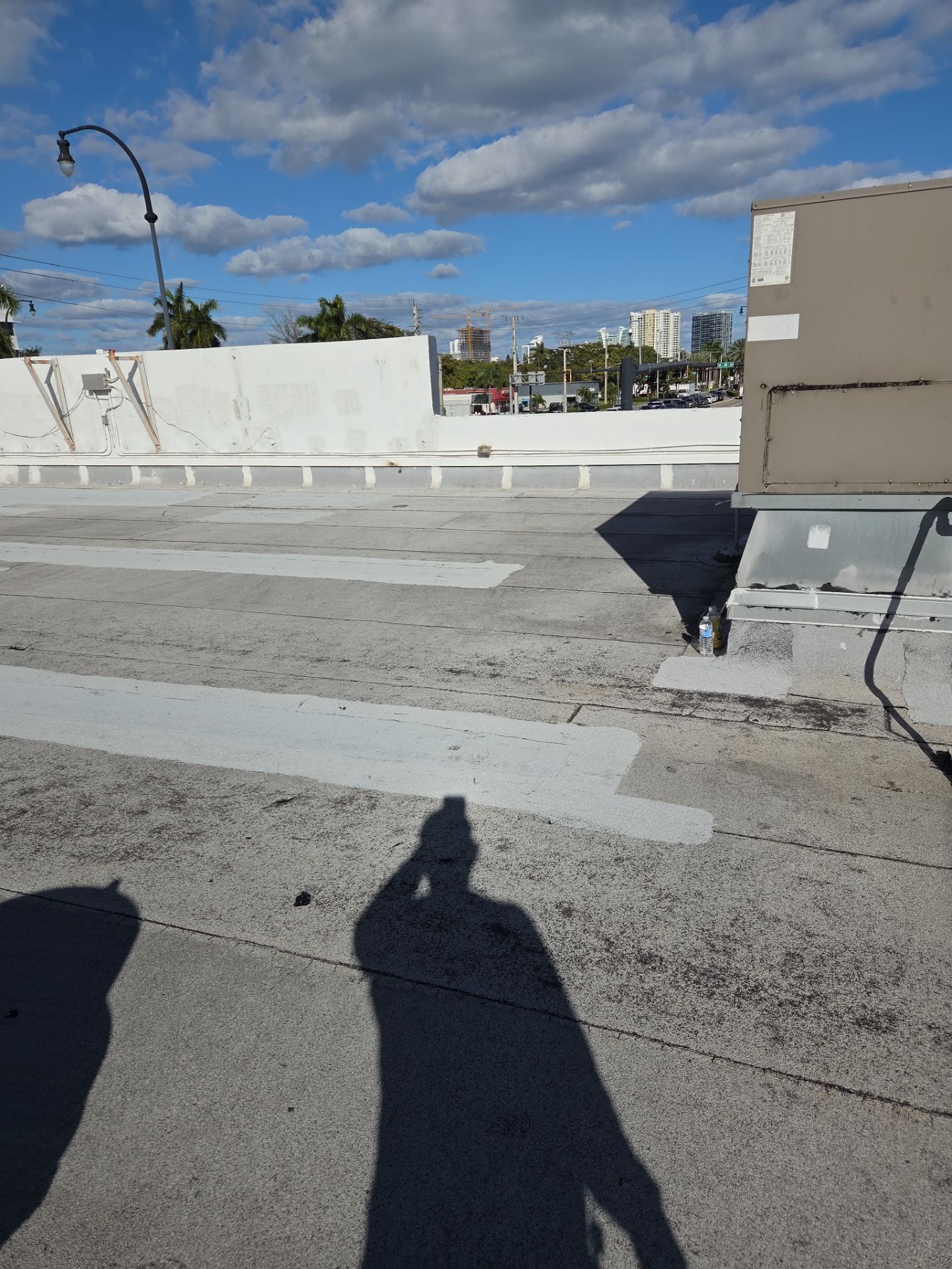 Commercial Flat Roof Restoration Using Silicone Coating in Hallandale Beach by Aastro Roofing