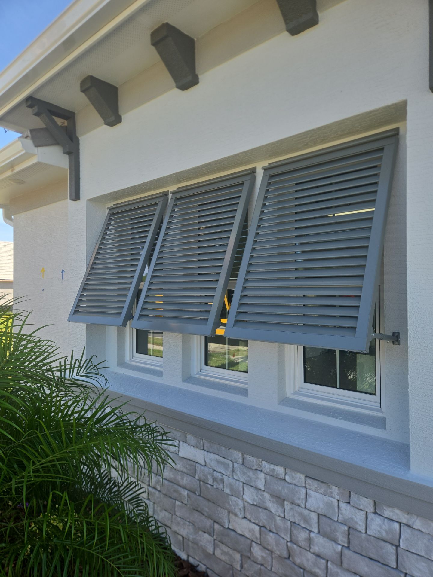 Decorative Bahama Shutters by Smart Guard Shutters