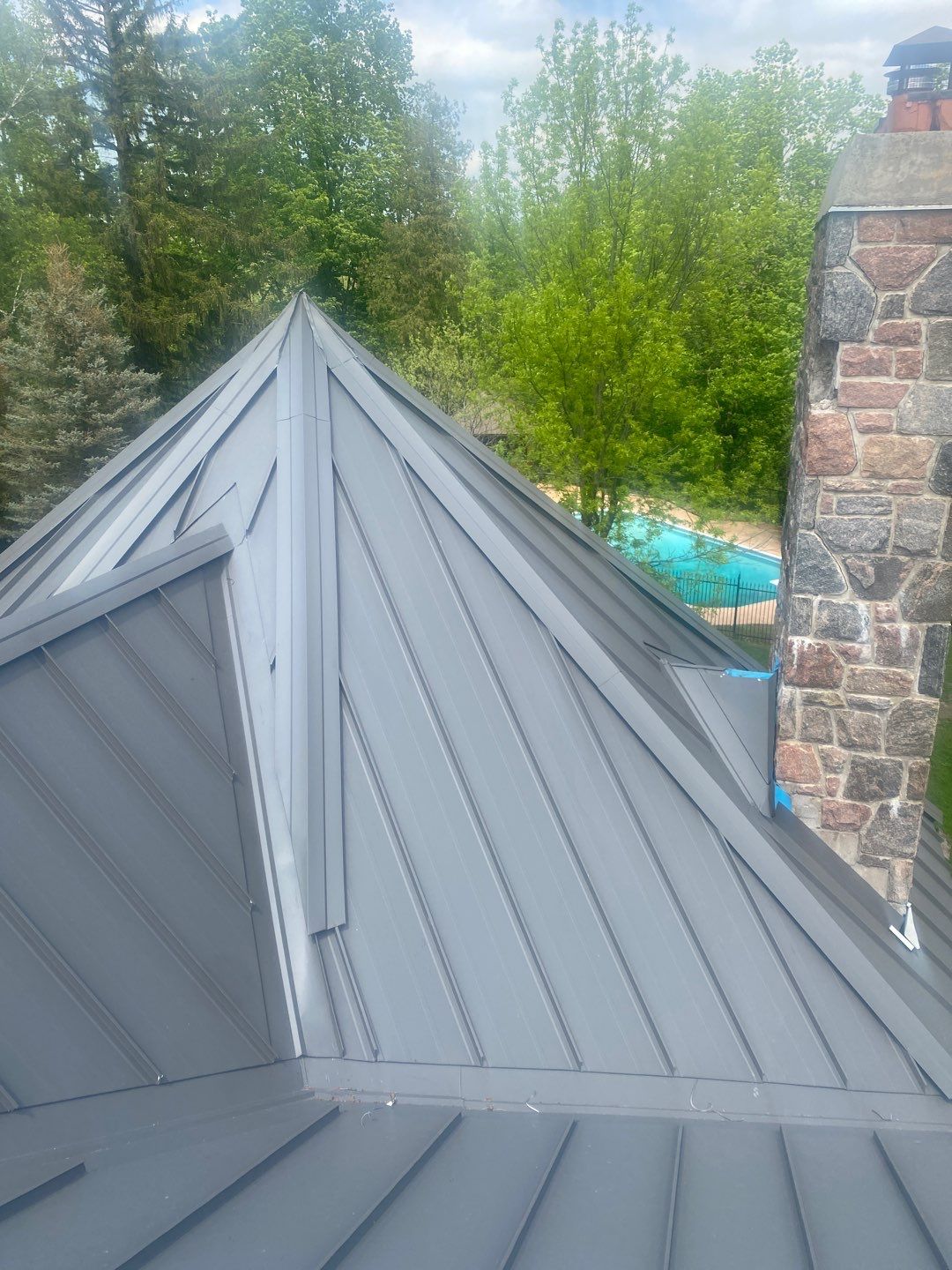 New Roof Installation using 16" Standing Seam Panels by Jay Carter Roofing & Sheet Metal