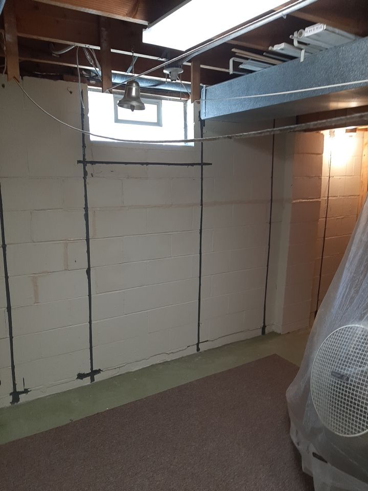 Wall Straightening and Reinforcement using Embedded Fiber Reinforcement by Toledo Basement Repair 