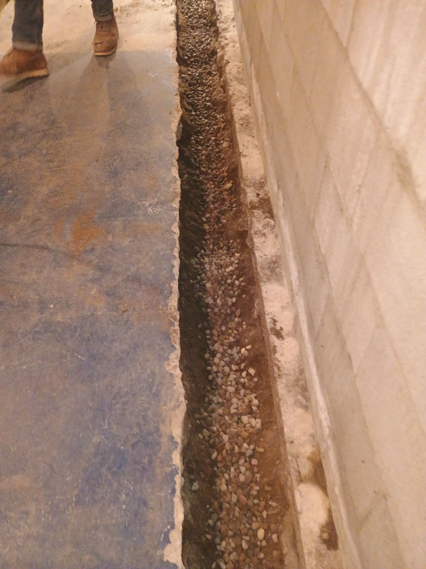 Interior Drain Tile & Buried Discharge in South Minneapolis by Waterproofing Northeast
