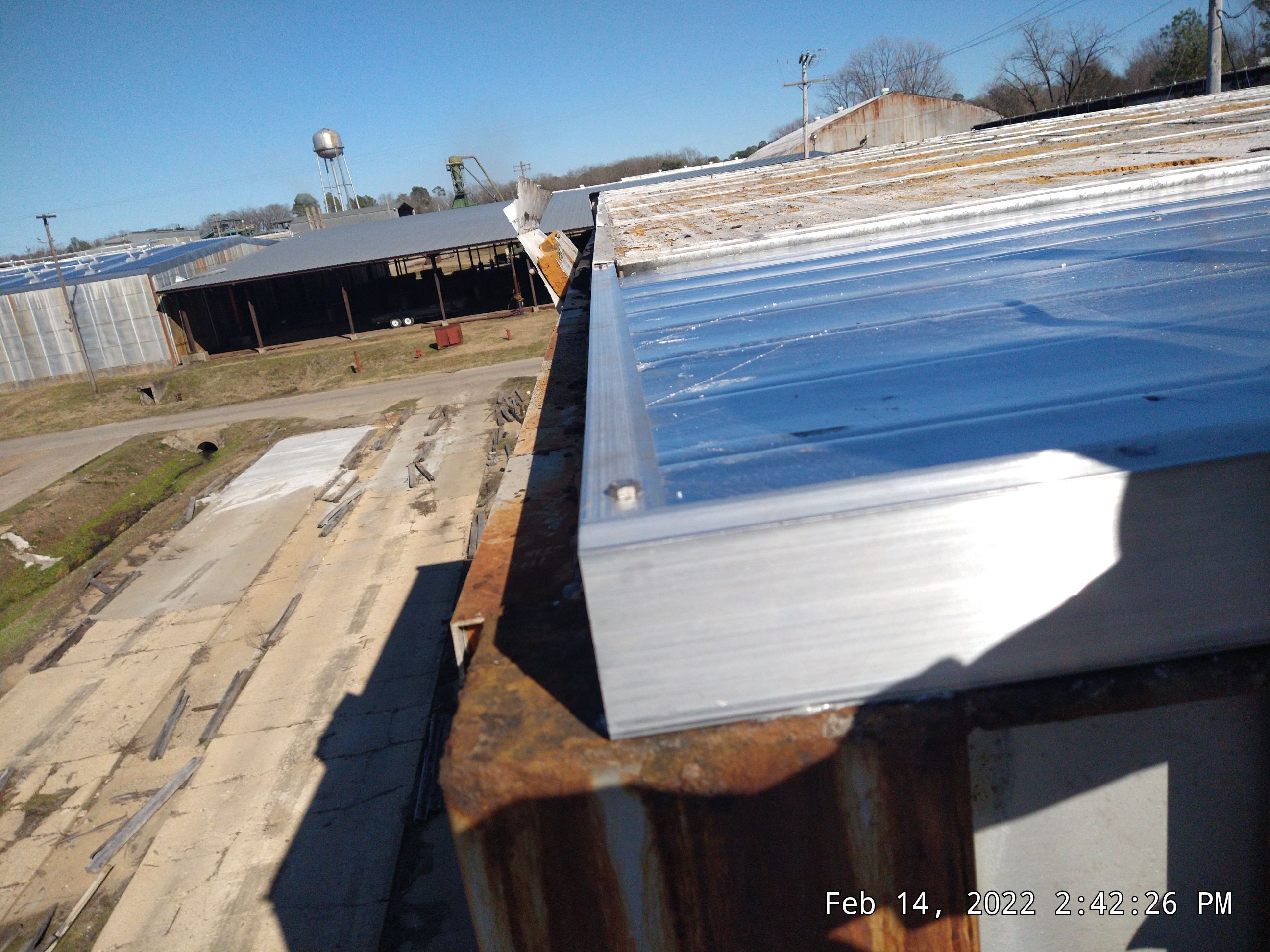 Commercial Roofing Installation using Aluminum Roofing panels by Hostetler Roofing