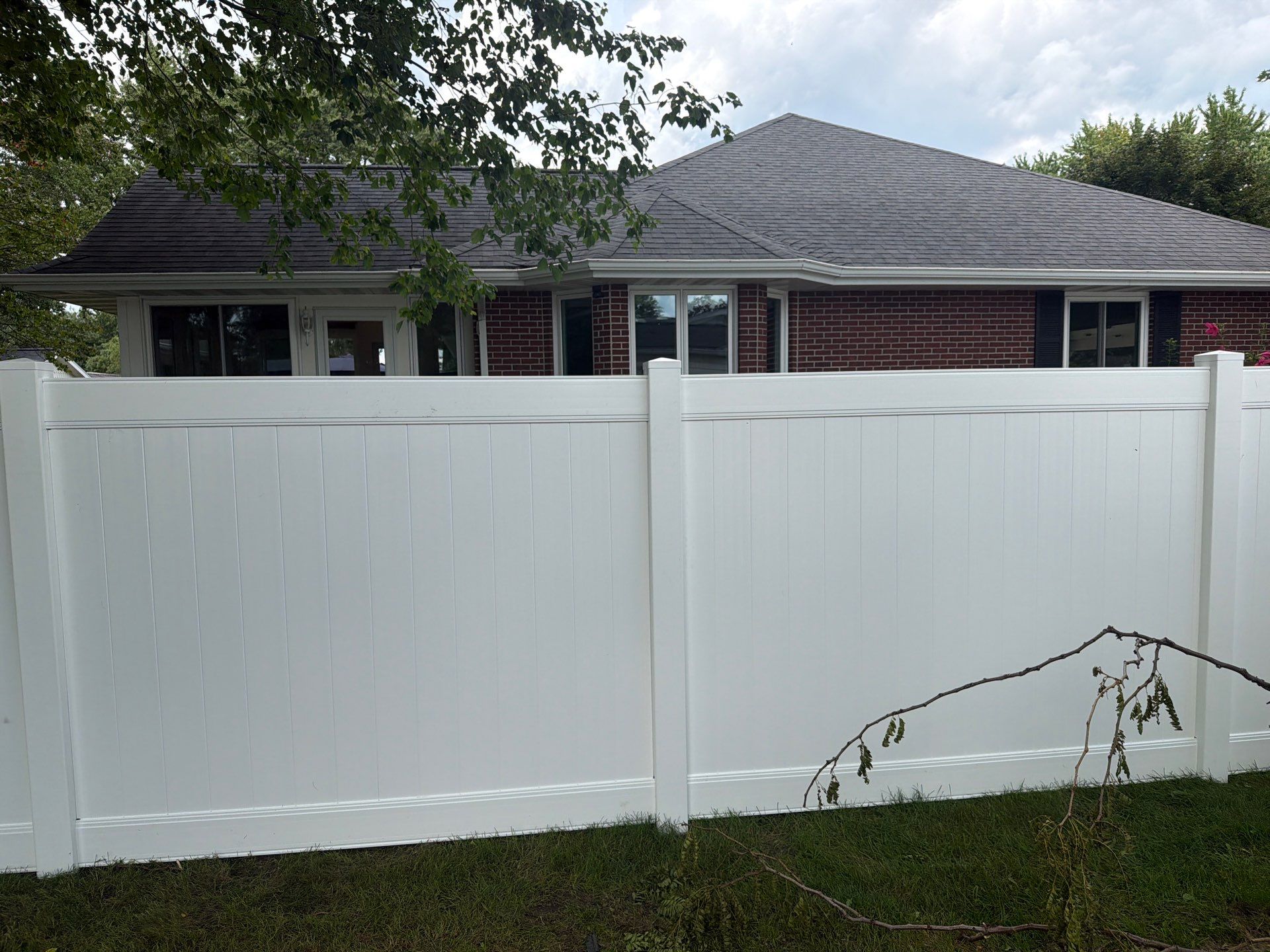 Residential White Vinyl Privacy and Black Chain Link Fencing in Jesup by Perfect Picket Fence and Stain