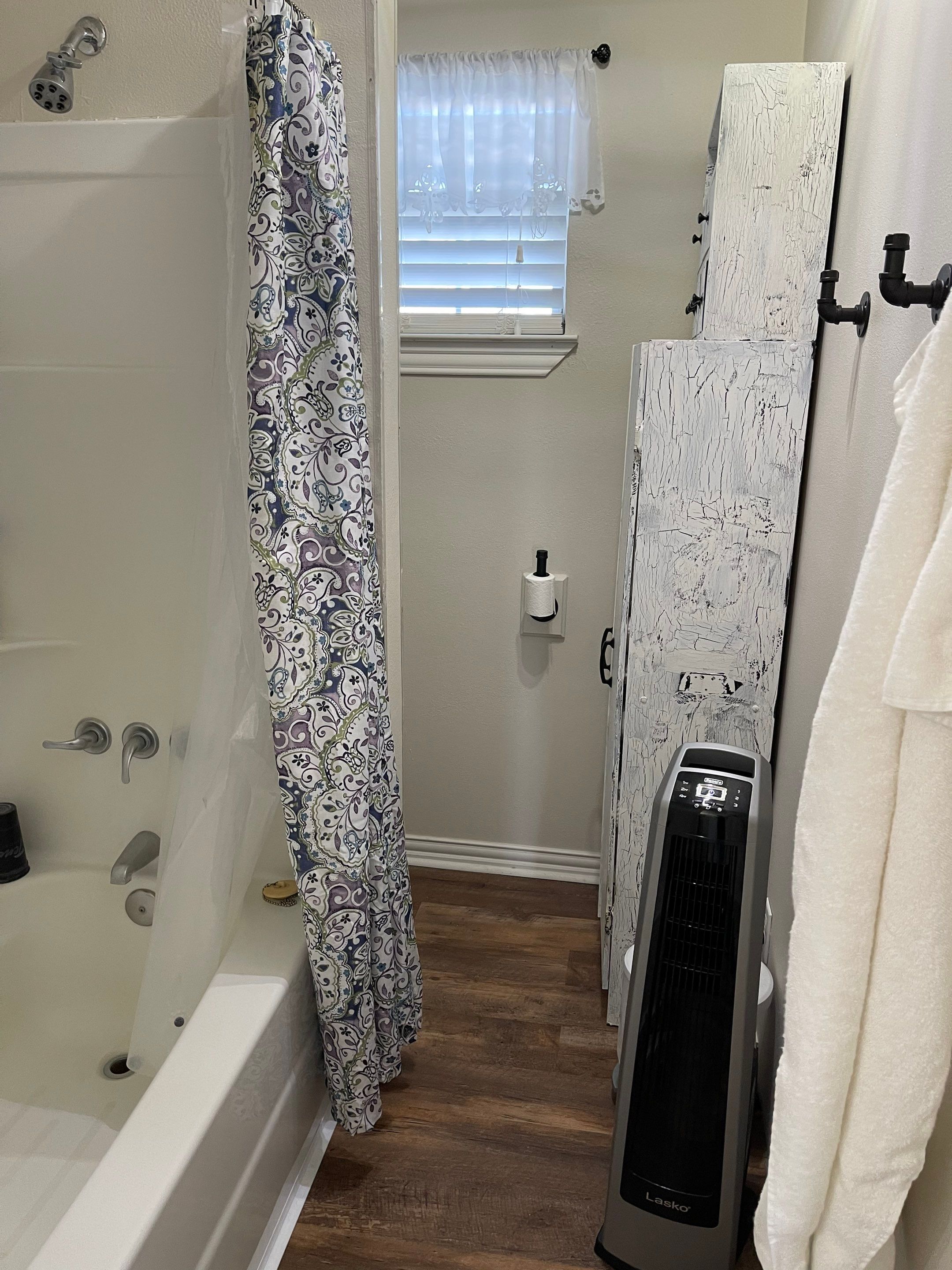 Bathroom Remodel using Tile  by SLM General Contractors & Roofing