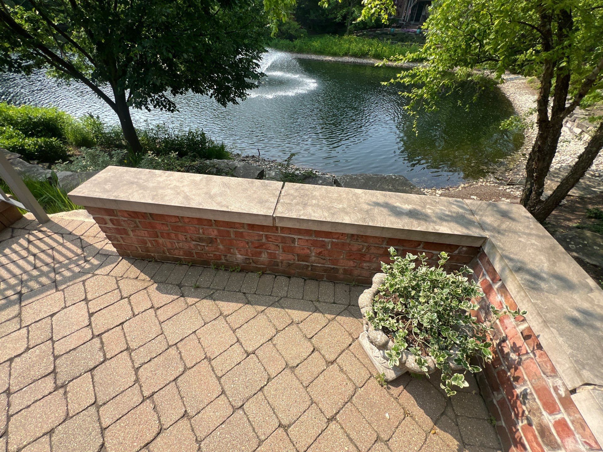 Brick paver cleaning sanding and sealing by Northern Power Washing LLC.