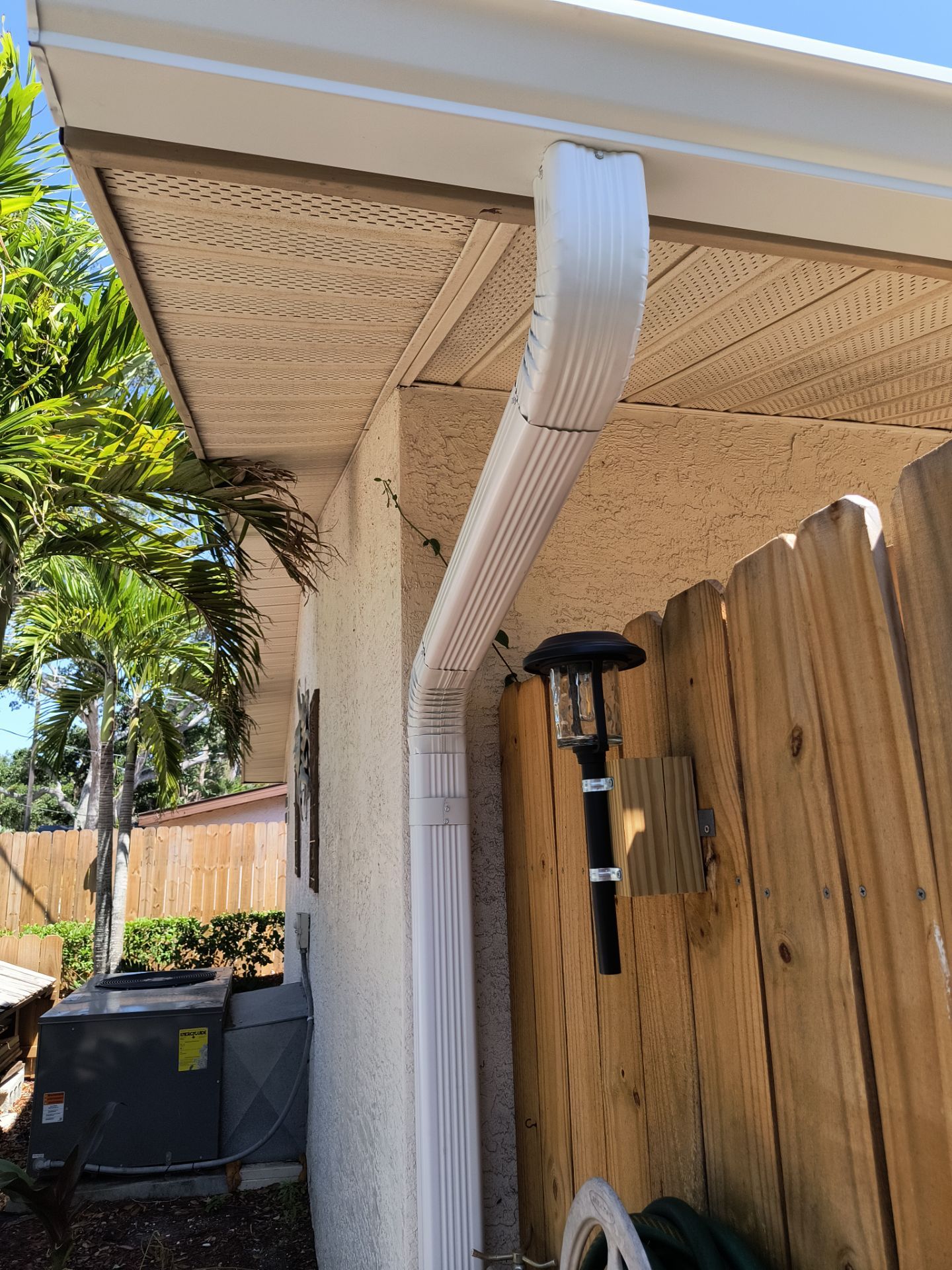 K-Style Seamless Gutter Installation using 3X4 Elbow Downspout in Sarasota FL by Gutter Professors