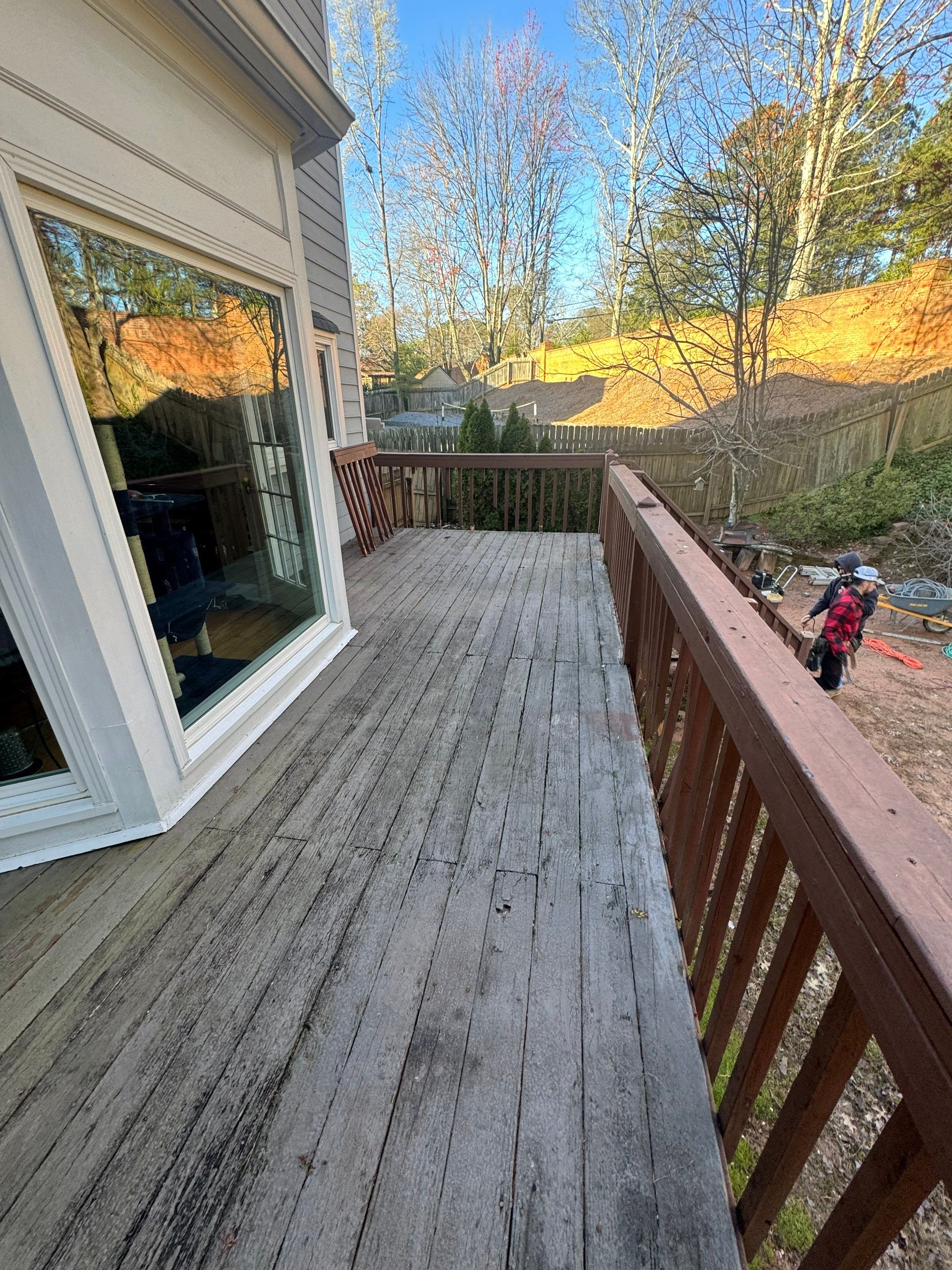 Elevated Deck Replacement with Black Metal Railings in Johns Creek by Swift Home Renovations