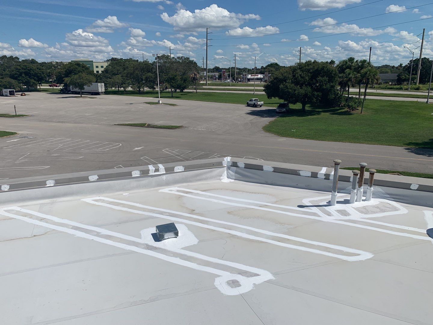 Silicone Roof Coating and Parapet Wall Repairs in South Bradenton by CES Roofing