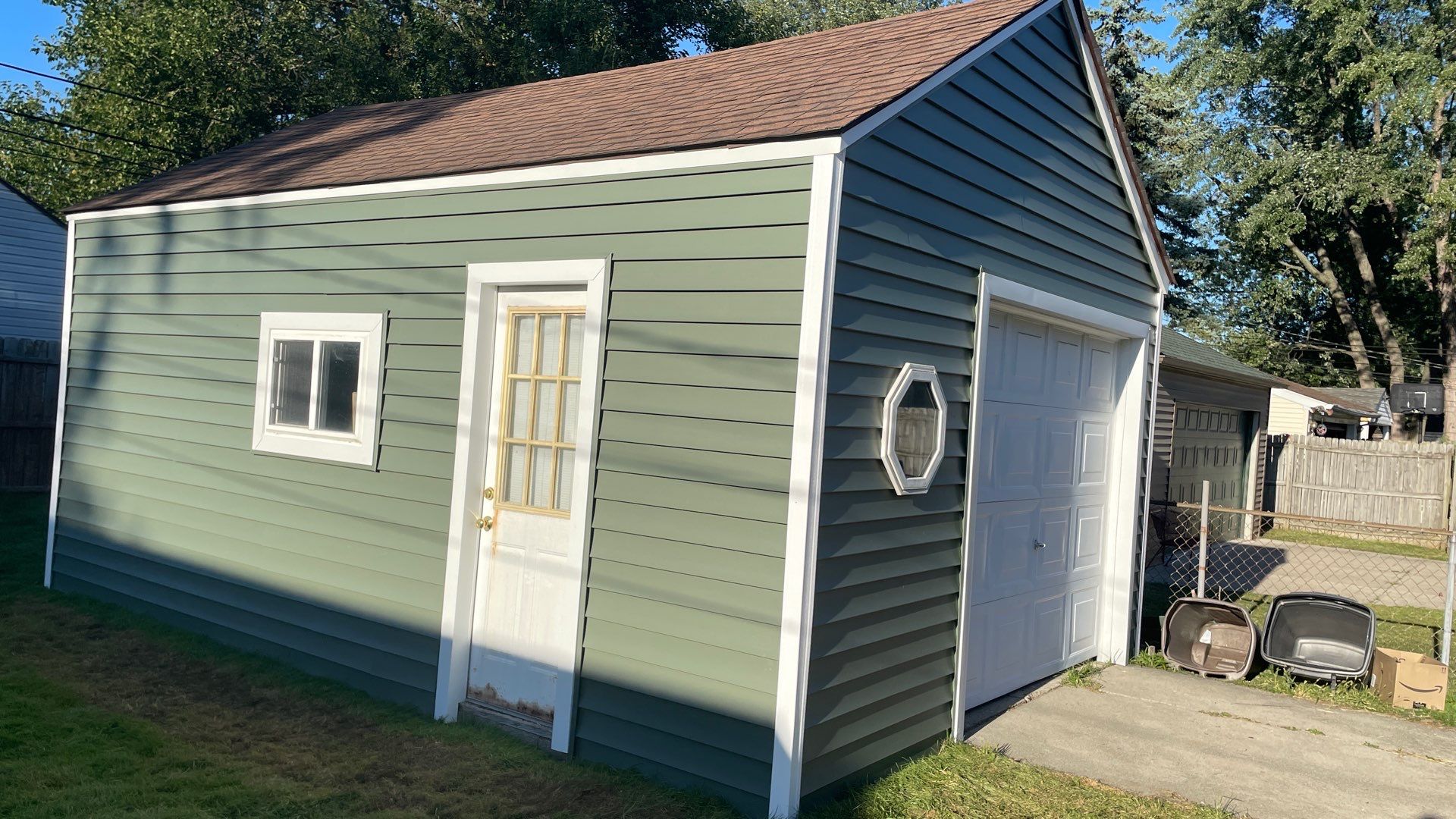 Siding Replacement using CertainTeed Restoration Classic D5 Forest Green by 180 Contractors