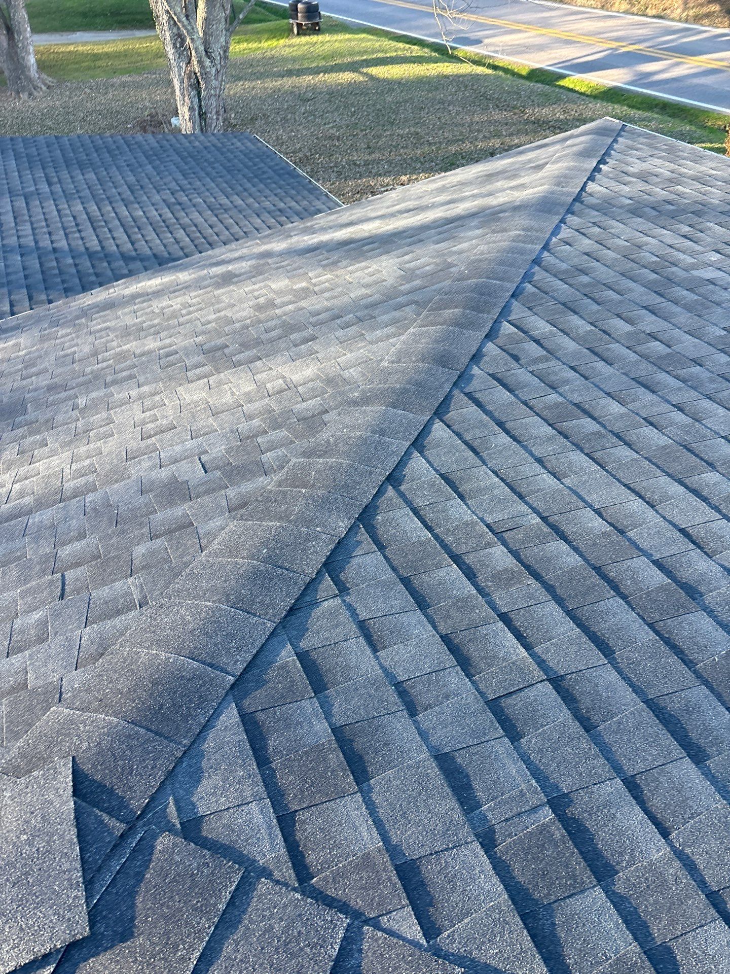 Residential Roofing Installation using GAF Timberline HDZ Charcoal by Rainstoppers Roofing