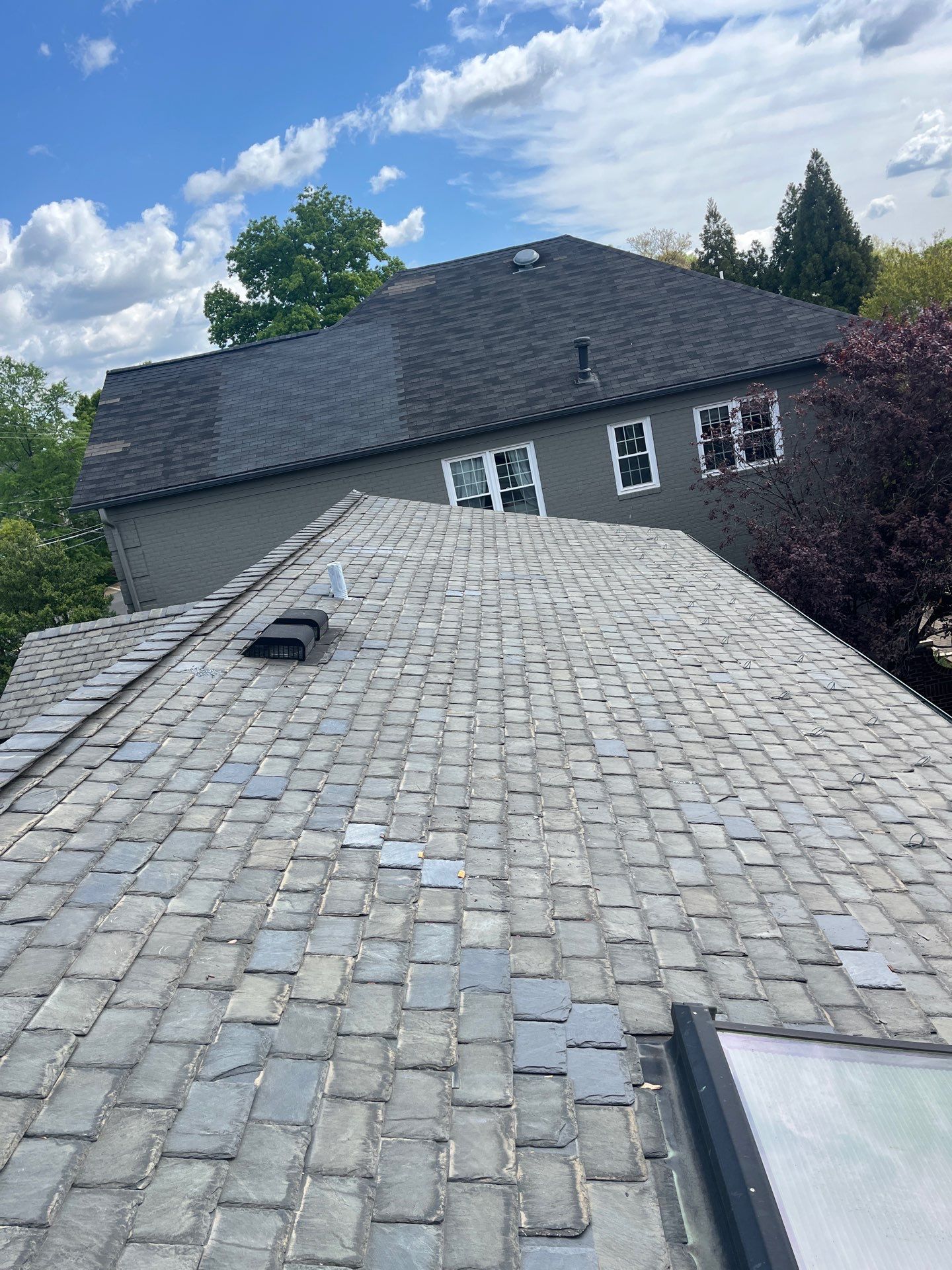 Arlington: Buckingham Slate and Carlisle Syntec TPO Roof by RM Banning, Inc.