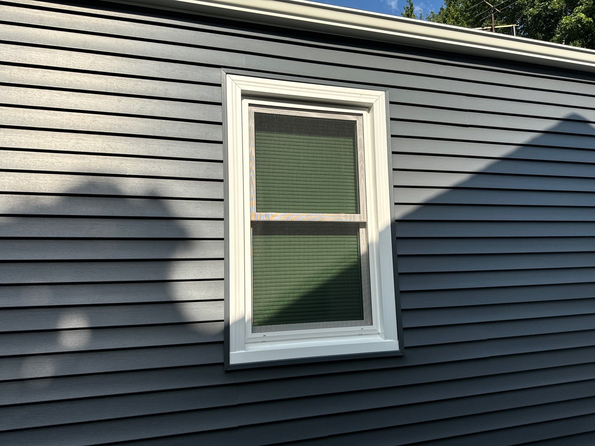 NKC Happy Blues by EEC Windows, Siding & Roofing