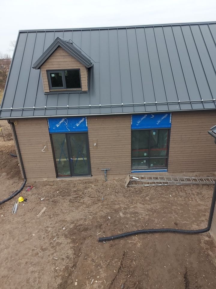 New Home Construction using 16" Standing Seam Panels by Jay Carter Roofing & Sheet Metal