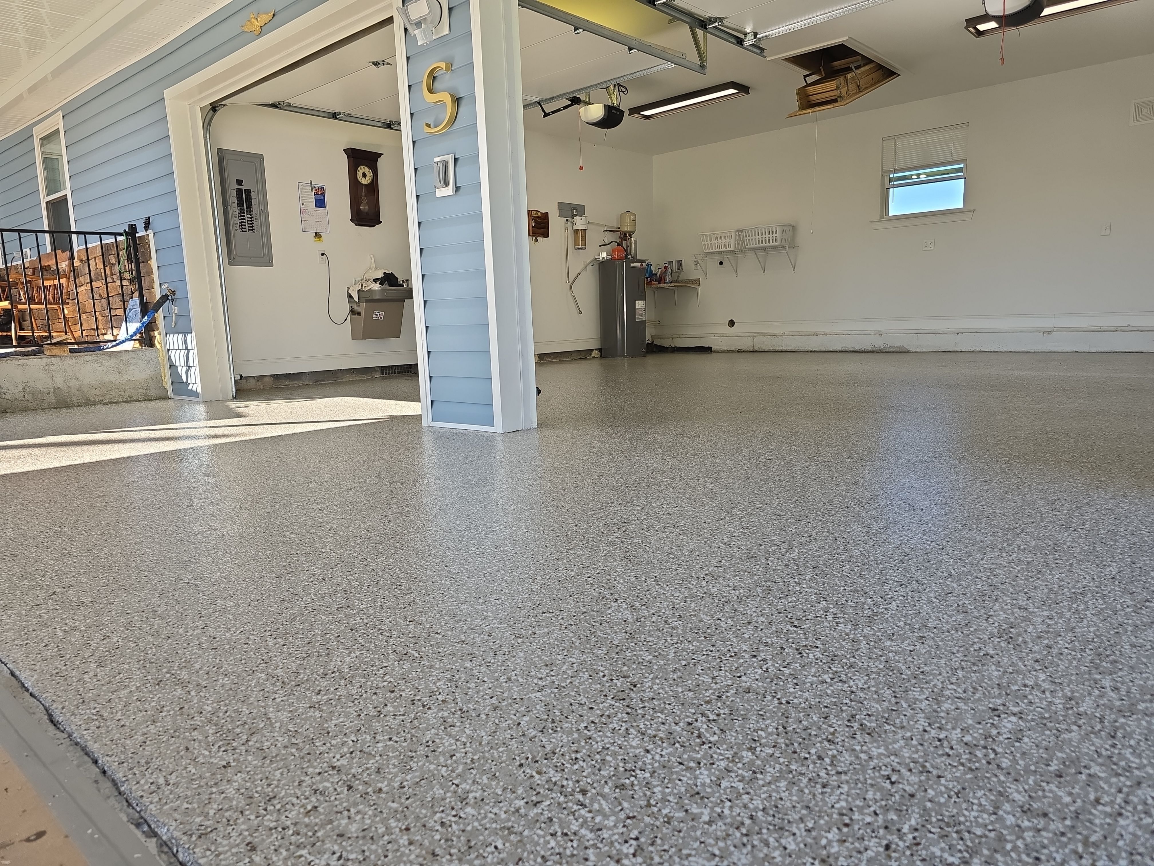 Garage & Patio Transformation Using Creekbed by Elite Floor Solutions